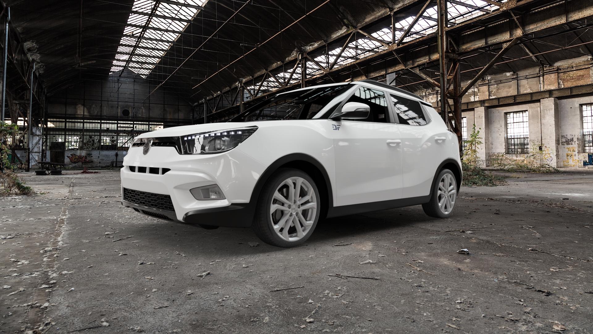 DEZENT TA SILVER Felge mit Reifen silber in 18Zoll Winterfelge Alufelge auf weissem Ssangyong Tivoli Typ XK ⬇️ mit 15mm Tieferlegung ⬇️ Old Industrial Hall_max5000mm_2022 Frontansicht_1