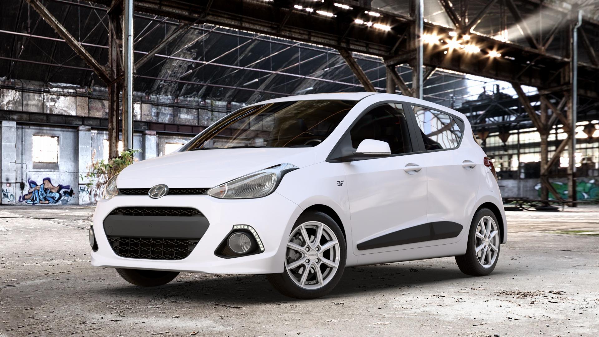 DEZENT TN SILVER Felge mit Reifen silber in 15Zoll Winterfelge Alufelge auf weissem Hyundai i10 Typ IA ⬇️ mit 15mm Tieferlegung ⬇️ Old Industrial Hall_max_4400mm_2024 Frontansicht_1