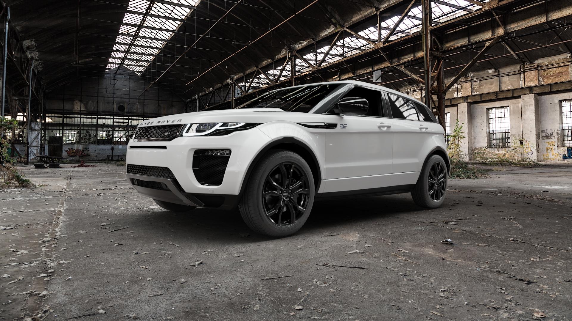 DEZENT TV BLACK Felge mit Reifen schwarz in 19Zoll Winterfelge Alufelge auf weissem Land Rover Range Evoque Typ LV Facelift ⬇️ mit 15mm Tieferlegung ⬇️ Old Industrial Hall_max5000mm_2022 Frontansicht_1
