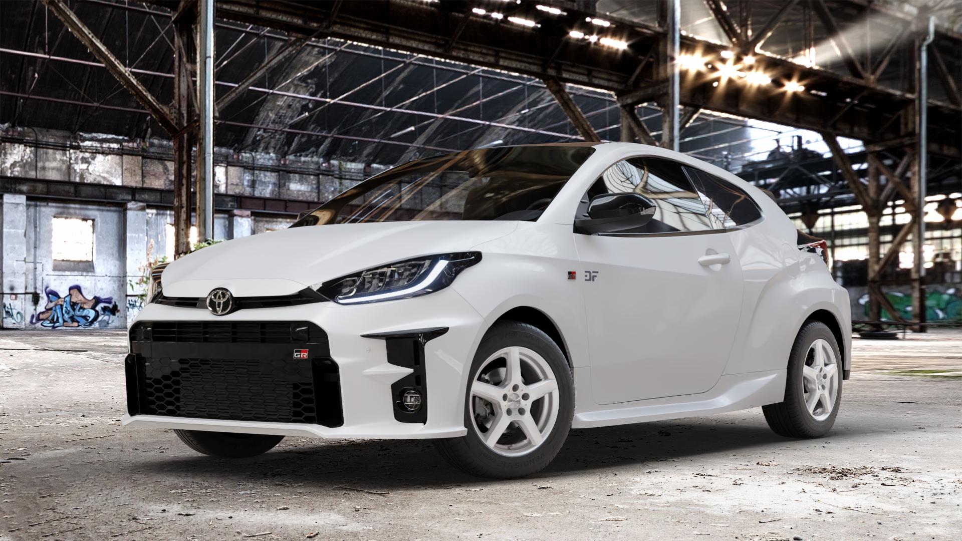 DEZENT TY SILVER Felge mit Reifen silber in 15Zoll Winterfelge Alufelge auf weissem Toyota Yaris IV Typ XPA1F(EU,M) l kW (0 PS) GR XPA1G(EU,M) ⬇️ mit 15mm Tieferlegung ⬇️ Old Industrial Hall_max_4400mm_2024 Frontansicht_1