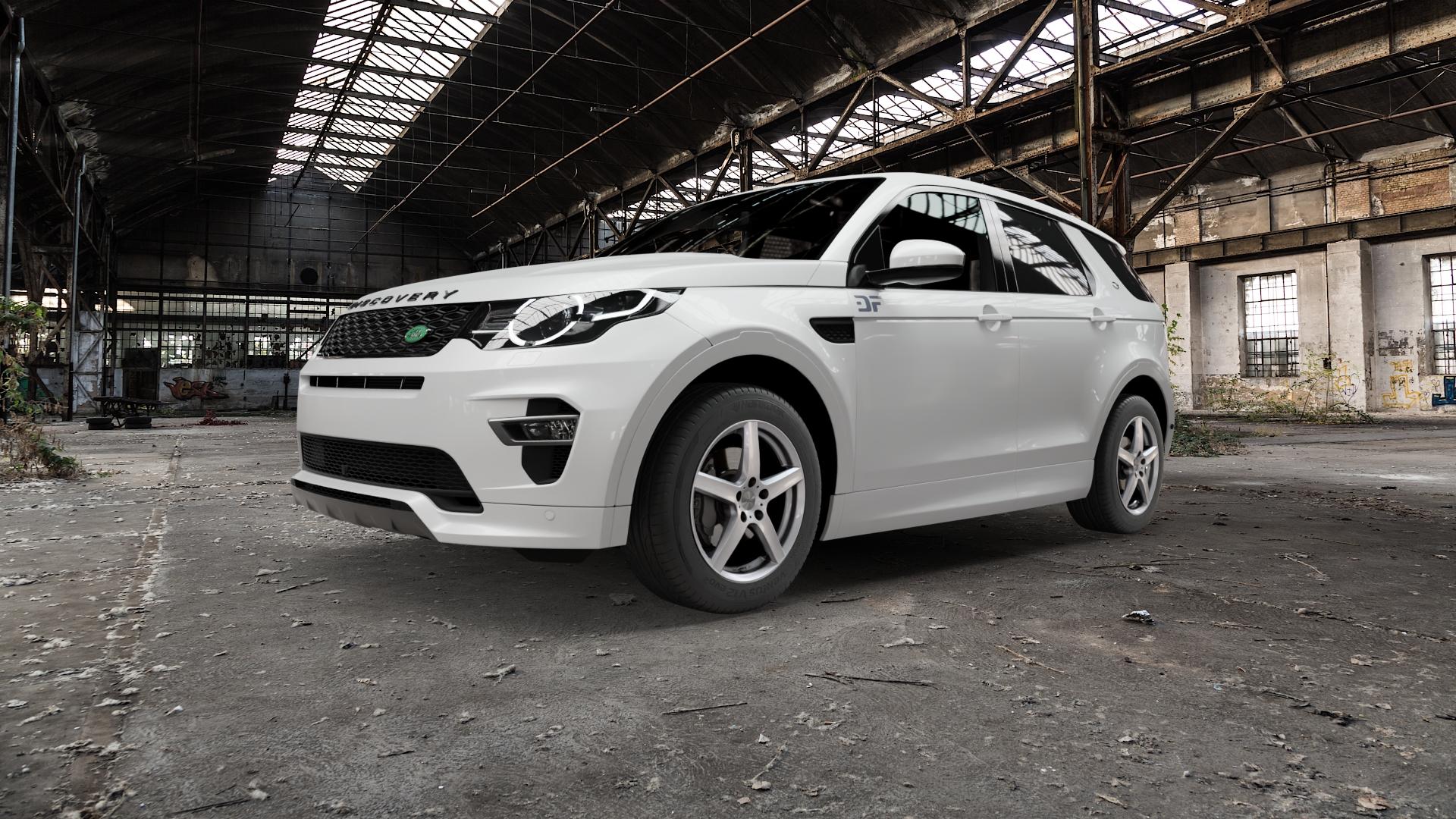 DEZENT TY SILVER Felge mit Reifen silber in 18Zoll Winterfelge Alufelge auf weissem Land Rover Discovery Sport Typ LC Facelift ⬇️ mit 15mm Tieferlegung ⬇️ Old Industrial Hall_max5000mm_2022 Frontansicht_1