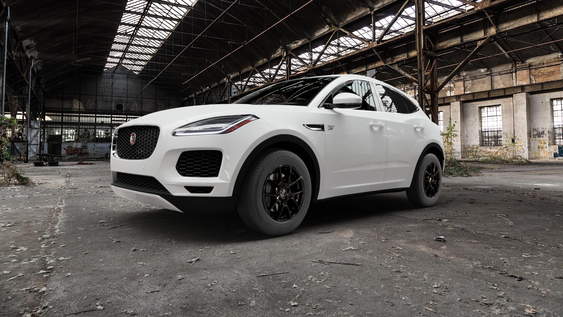 DIEWE WHEELS NEVE Black glossy Felge mit Reifen schwarz in 17Zoll Winterfelge Alufelge auf weissem Jaguar E-Pace Typ DF ⬇️ mit 15mm Tieferlegung ⬇️ Old Industrial Hall_max5000mm_2022 Frontansicht_1