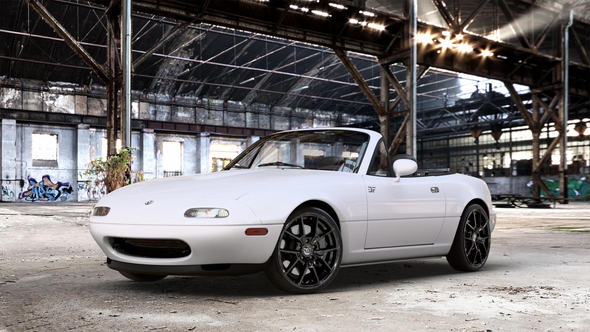DIEWE WHEELS NEVE Black glossy Felge mit Reifen schwarz in 17Zoll Winterfelge Alufelge auf weissem Mazda MX-5 I (NA) ⬇️ mit 15mm Tieferlegung ⬇️ Old Industrial Hall_max_4400mm_2024 Frontansicht_1