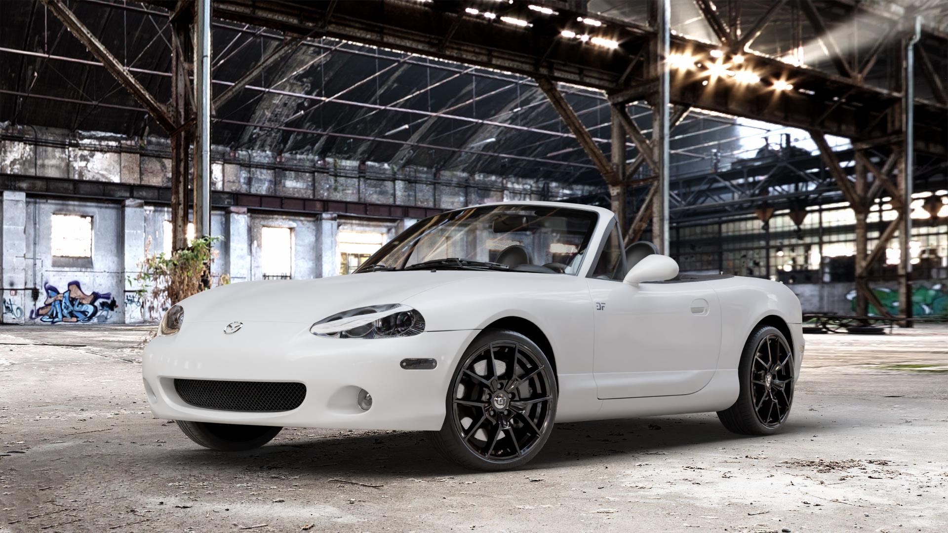 DIEWE WHEELS NEVE Black glossy Felge mit Reifen schwarz in 17Zoll Winterfelge Alufelge auf weissem Mazda MX-5 II (NB) ⬇️ mit 15mm Tieferlegung ⬇️ Old Industrial Hall_max_4400mm_2024 Frontansicht_1