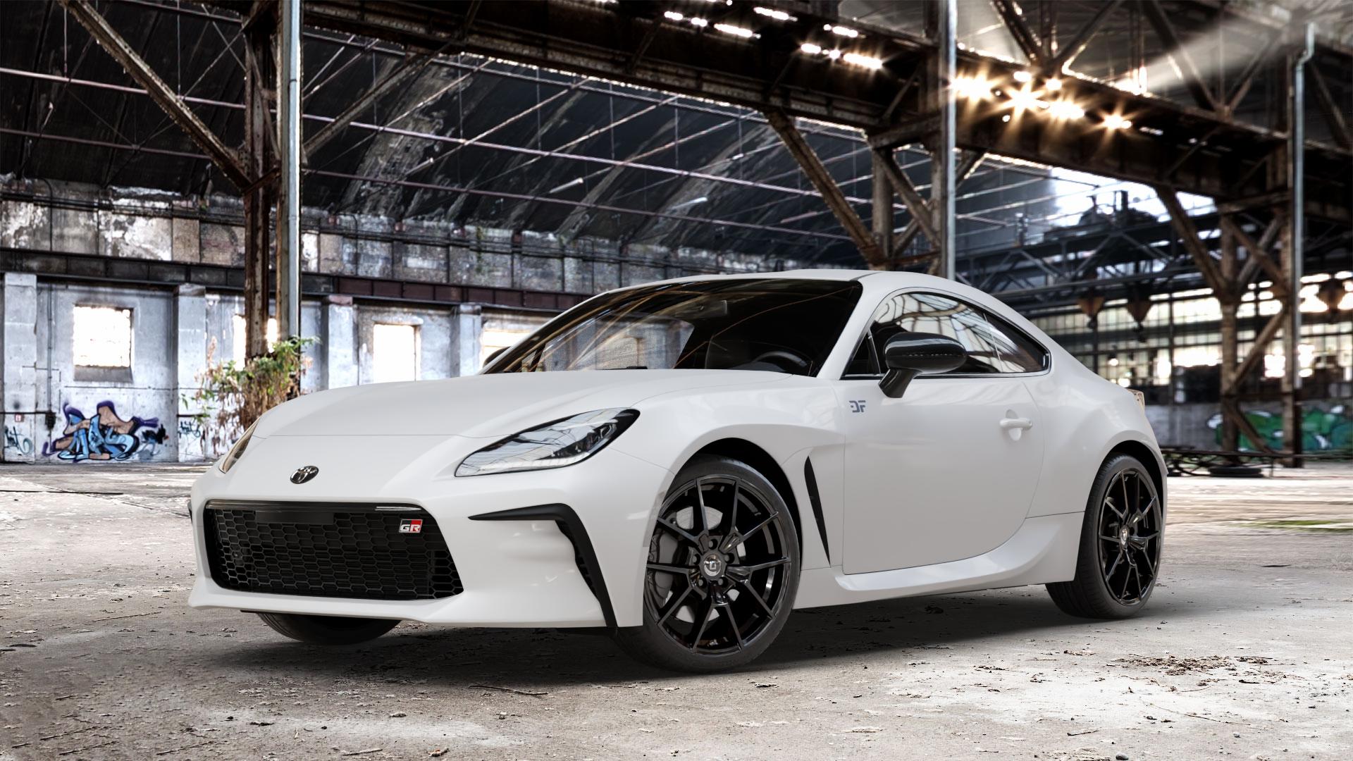DIEWE WHEELS NEVE Black glossy Felge mit Reifen schwarz in 18Zoll Winterfelge Alufelge auf weissem Toyota GR86 Typ T2 ⬇️ mit 15mm Tieferlegung ⬇️ Old Industrial Hall_max_4400mm_2024 Frontansicht_1