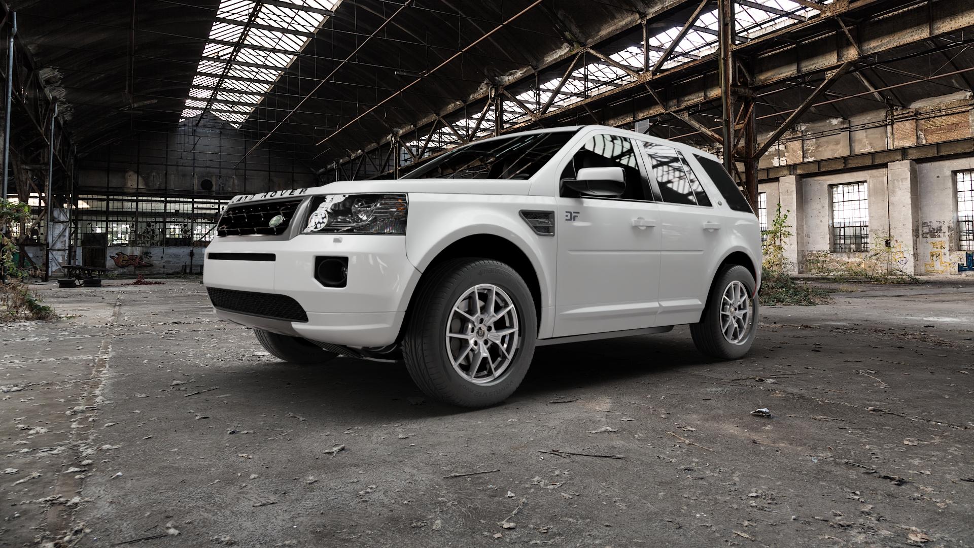 DIEWE WHEELS NEVE Silver Felge mit Reifen silber in 17Zoll Winterfelge Alufelge auf weissem Land Rover Freelander II Typ LF ⬇️ mit 15mm Tieferlegung ⬇️ Old Industrial Hall_max5000mm_2022 Frontansicht_1