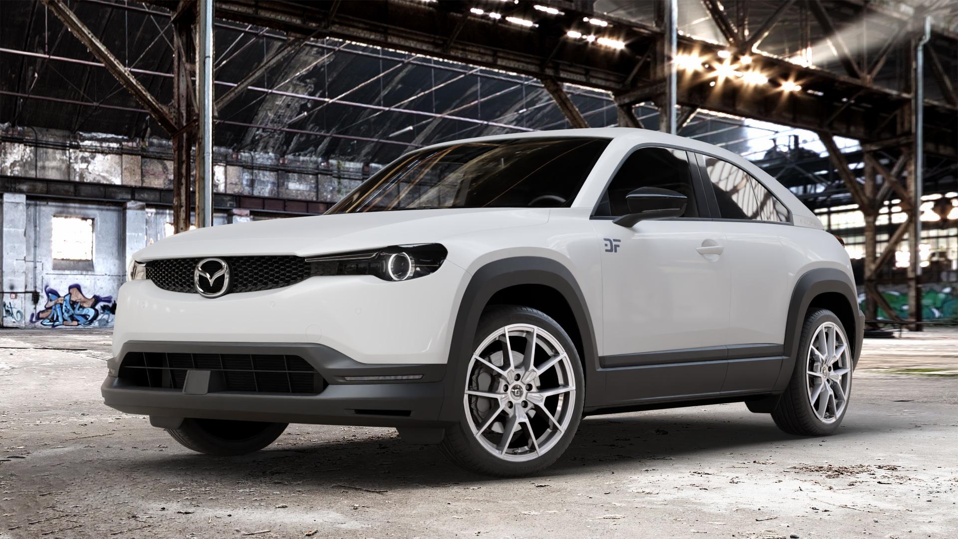 DIEWE WHEELS NEVE Silver Felge mit Reifen silber in 19Zoll Winterfelge Alufelge auf weissem Mazda MX-30 (DR) ⬇️ mit 15mm Tieferlegung ⬇️ Old Industrial Hall_max_4400mm_2024 Frontansicht_1