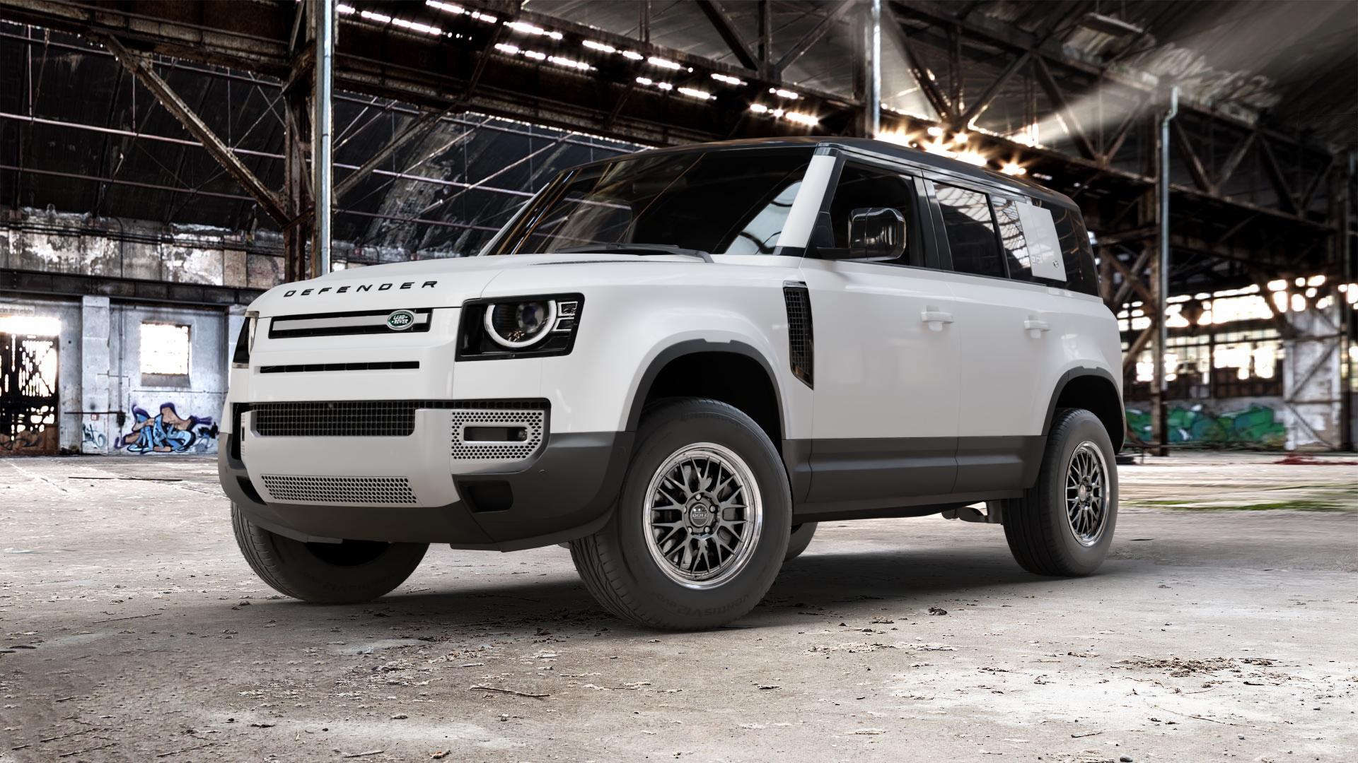 DOTZ BILBAO GUNMETAL/POLISHED LIP Felge mit Reifen grau silber mehrfarbig anthrazit in 17Zoll Winterfelge Alufelge auf weissem Land Rover Defender 110 Typ LE ⬇️ mit 15mm Tieferlegung ⬇️ Old Industrial Hall_max_5300mm_2024 Frontansicht_1