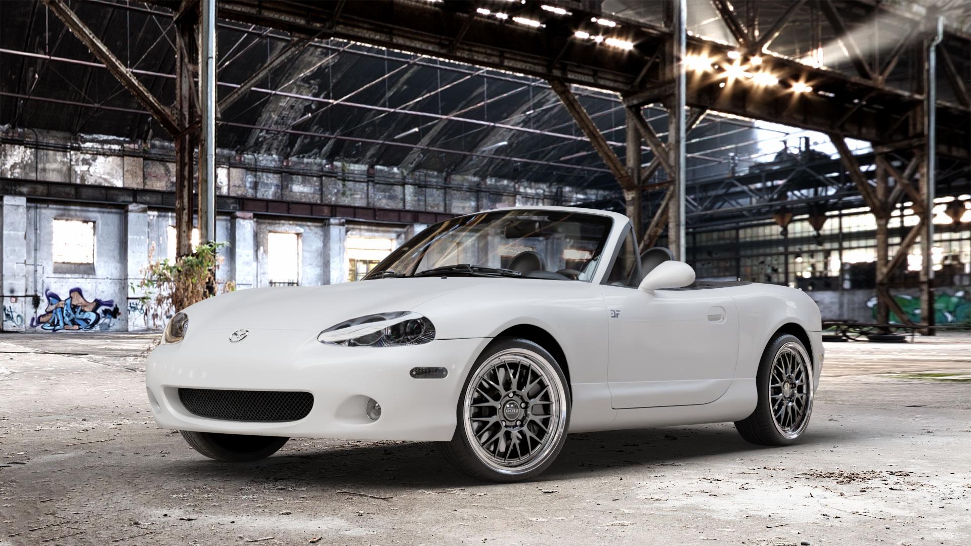 DOTZ BILBAO GUNMETAL/POLISHED LIP Felge mit Reifen grau silber mehrfarbig anthrazit in 17Zoll Winterfelge Alufelge auf weissem Mazda MX-5 II (NB) ⬇️ mit 15mm Tieferlegung ⬇️ Old Industrial Hall_max_4400mm_2024 Frontansicht_1