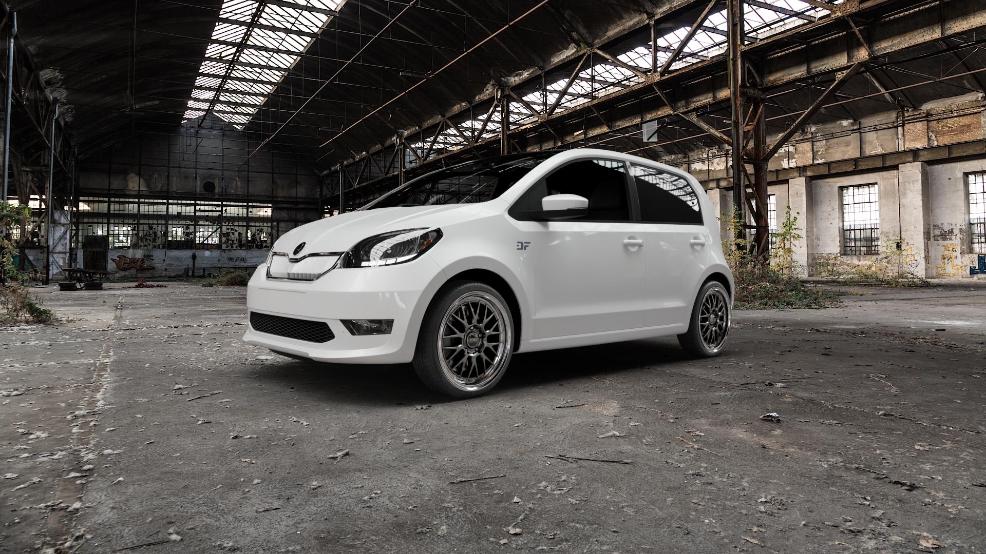 DOTZ BILBAO GUNMETAL/POLISHED LIP Felge mit Reifen grau silber mehrfarbig anthrazit in 17Zoll Winterfelge Alufelge auf weissem Skoda Citigo-e iV Typ AA ⬇️ mit 15mm Tieferlegung ⬇️ Old Industrial Hall_max5000mm_2022 Frontansicht_1