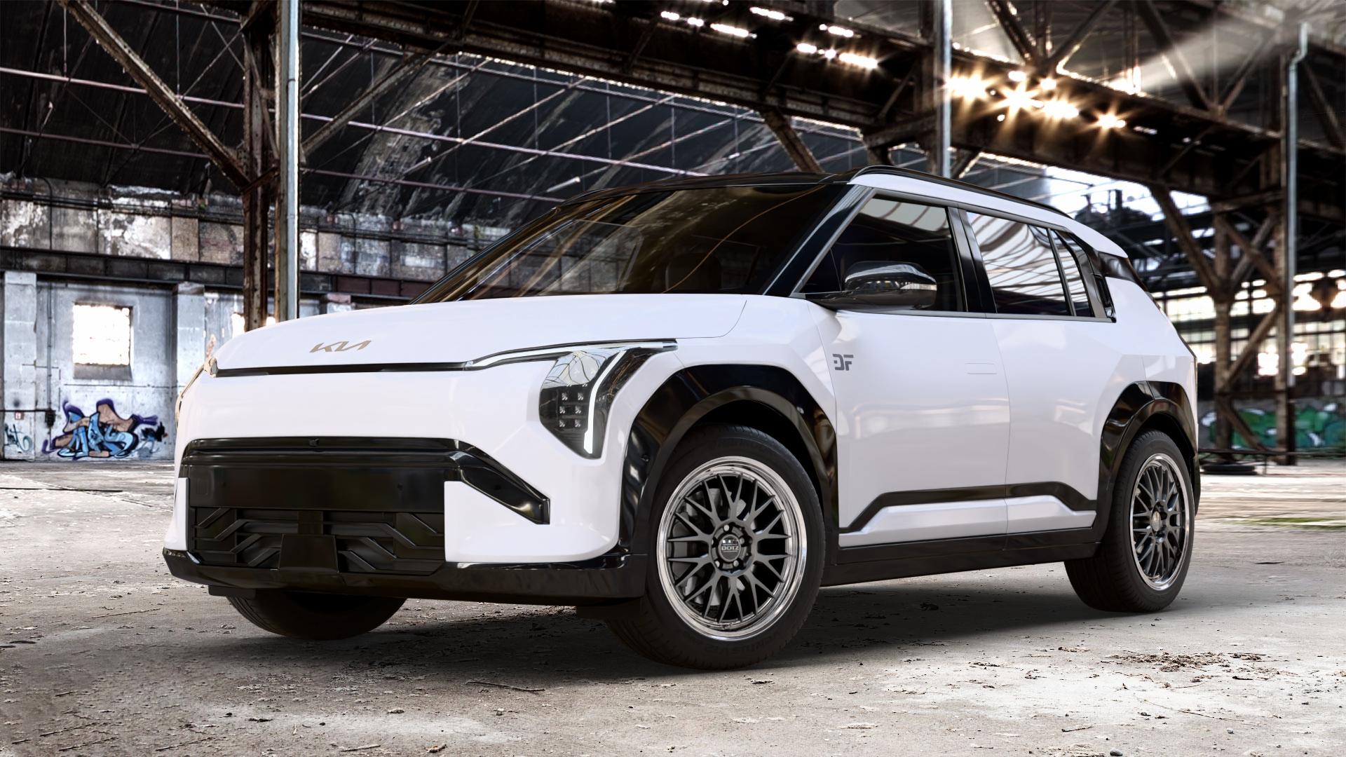 DOTZ BILBAO GUNMETAL/POLISHED LIP Felge mit Reifen grau silber mehrfarbig anthrazit in 18Zoll Winterfelge Alufelge auf weissem Kia EV3 Typ SV1 0,0l 50kW (68 PS) ⬇️ mit 15mm Tieferlegung ⬇️ Old Industrial Hall_max_4400mm_2024 Frontansicht_1