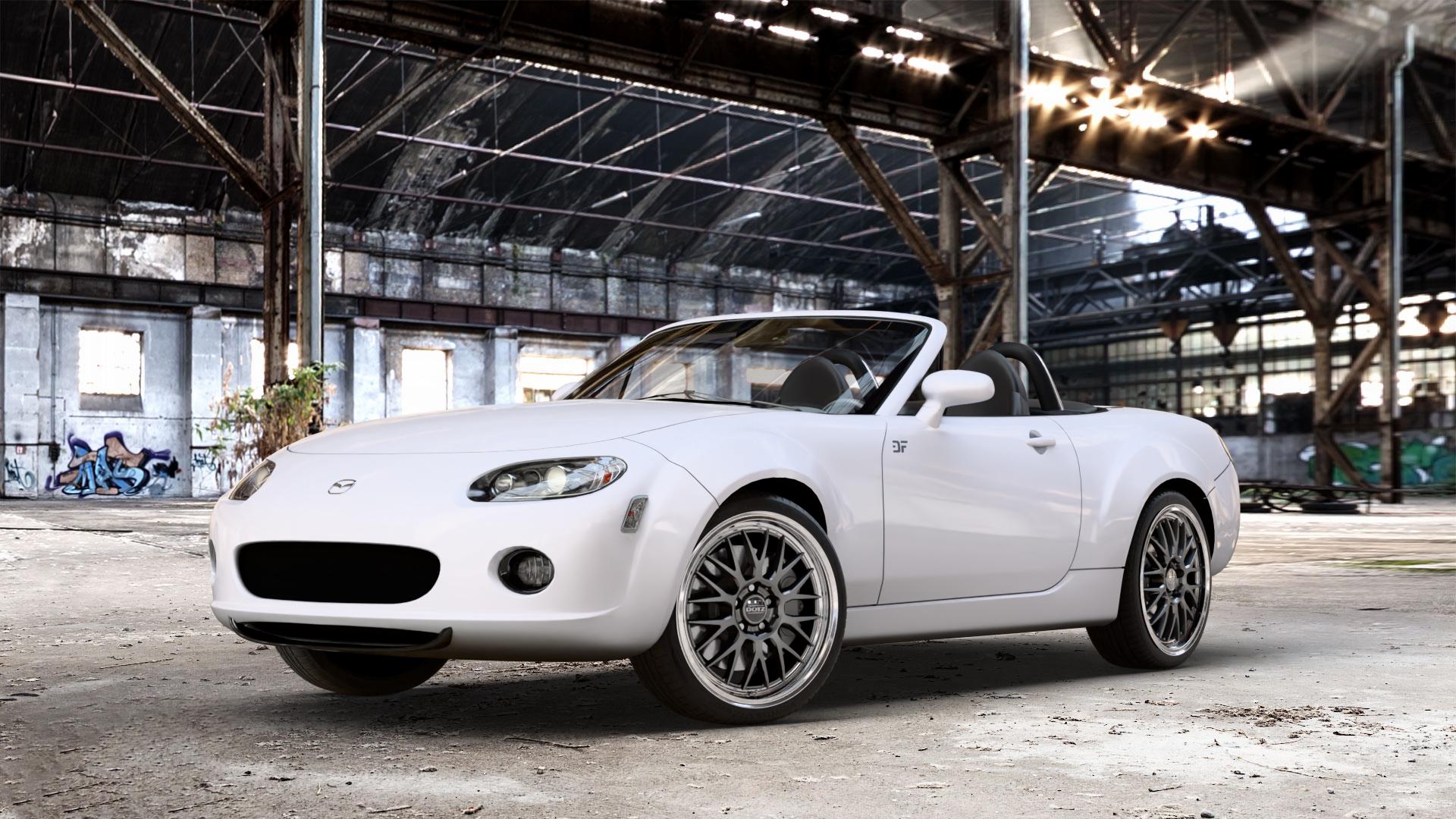 DOTZ BILBAO GUNMETAL/POLISHED LIP Felge mit Reifen grau silber mehrfarbig anthrazit in 18Zoll Winterfelge Alufelge auf weissem Mazda MX-5 III (NC) ⬇️ mit 15mm Tieferlegung ⬇️ Old Industrial Hall_max_4400mm_2024 Frontansicht_1