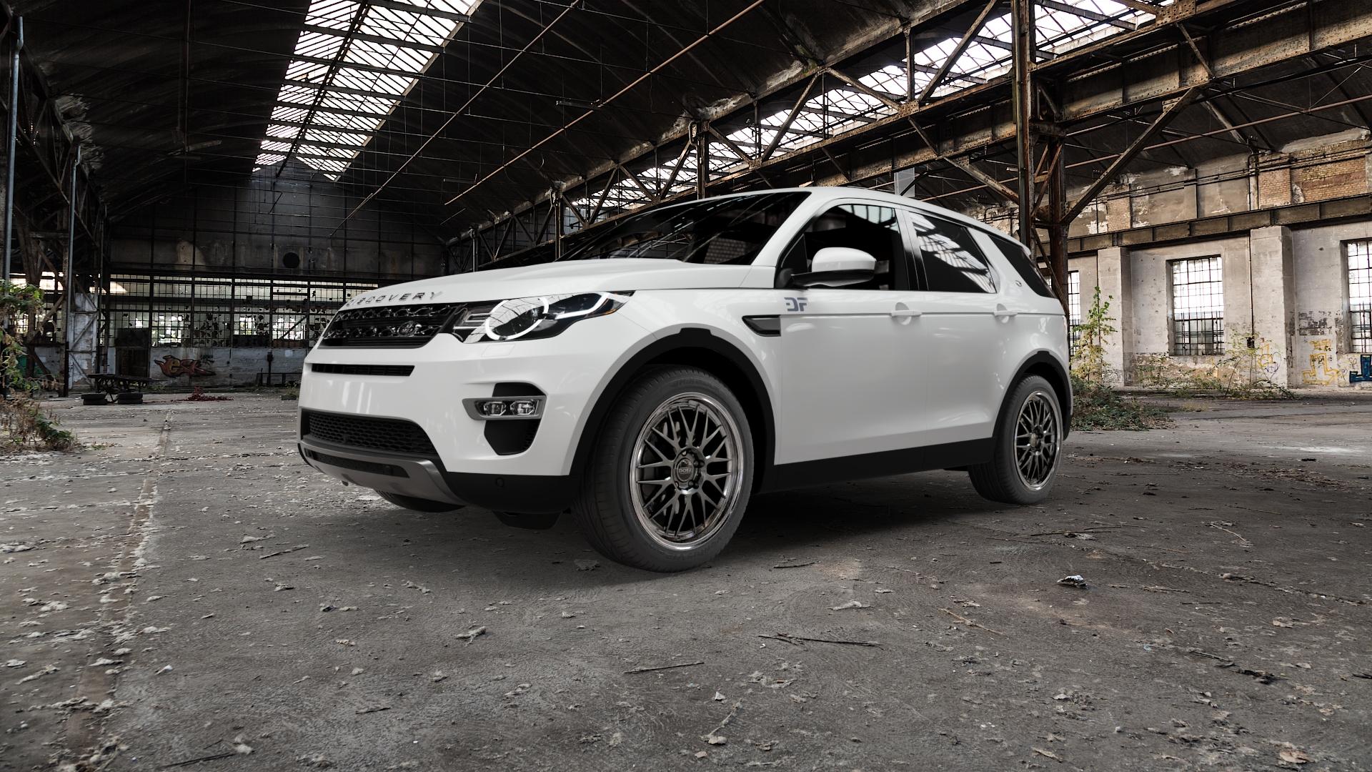 DOTZ BILBAO GUNMETAL/POLISHED LIP Felge mit Reifen grau silber mehrfarbig anthrazit in 19Zoll Winterfelge Alufelge auf weissem Land Rover Discovery Sport Typ LC ⬇️ mit 15mm Tieferlegung ⬇️ Old Industrial Hall_max5000mm_2022 Frontansicht_1