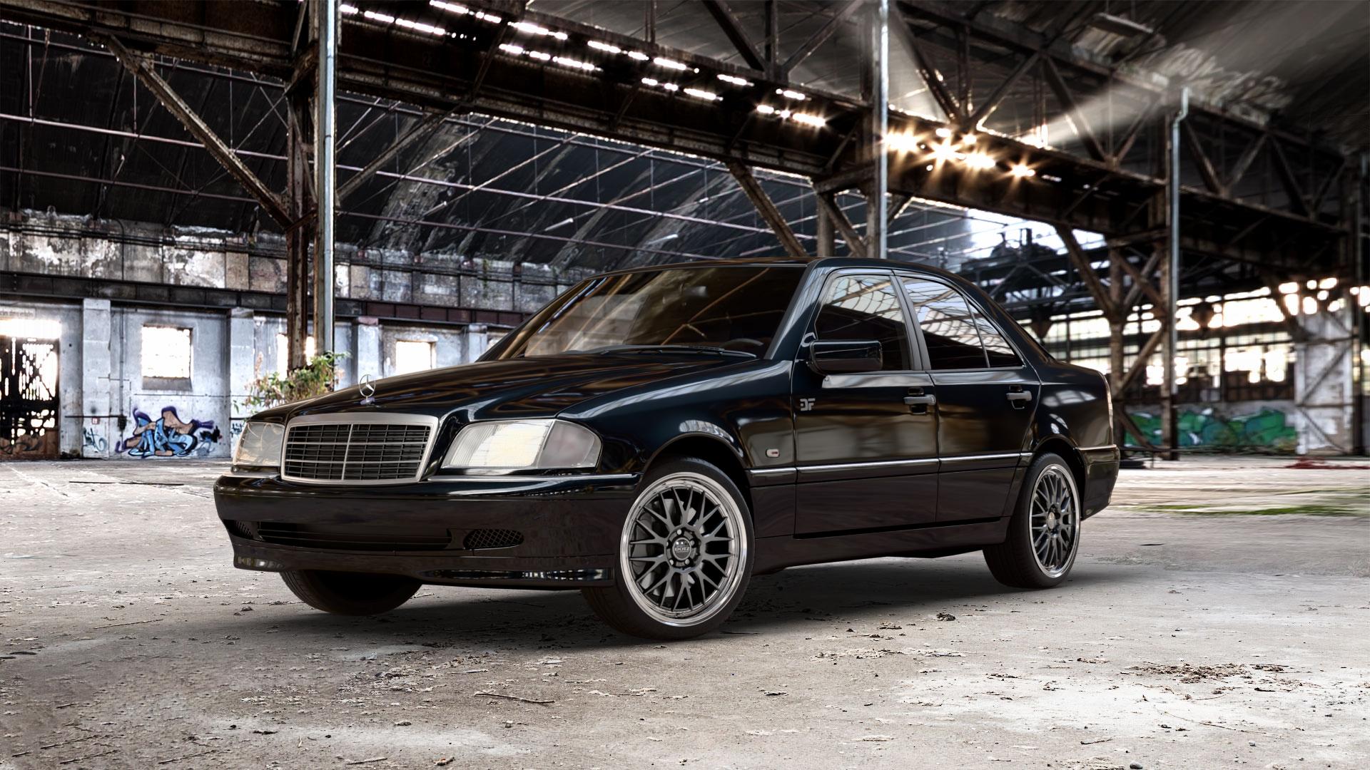 DOTZ BILBAO SILVER/POLISHED LIP Felge mit Reifen silber in 18Zoll Winterfelge Alufelge auf metallic schwarzem Mercedes C-Klasse Typ W202 Limousine ⬇️ mit 15mm Tieferlegung ⬇️ Old Industrial Hall_max_5300mm_2024 Frontansicht_1