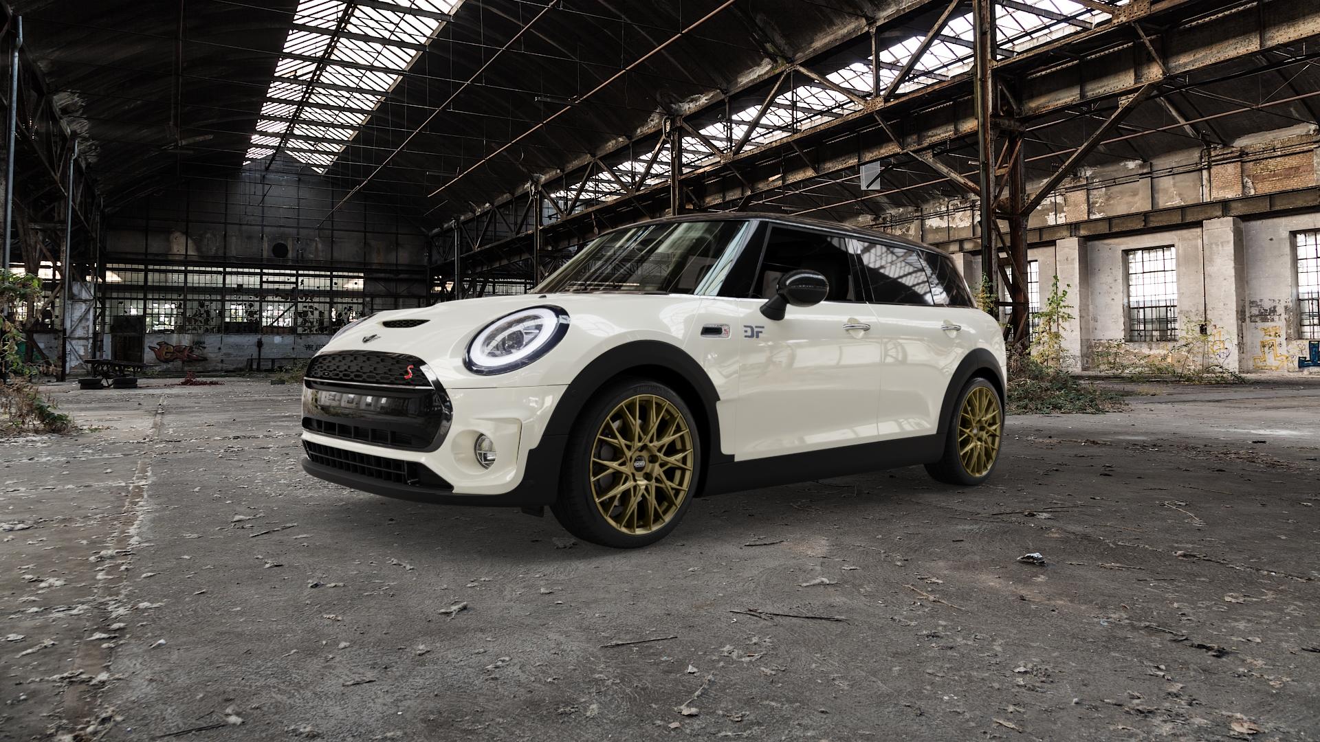 DOTZ FUJI GOLD Felge mit Reifen in 18Zoll Winterfelge Alufelge auf weissem Mini F54 Typ FMK (Clubman) Facelift ⬇️ mit 15mm Tieferlegung ⬇️ Old Industrial Hall_max5000mm_2022 Frontansicht_1