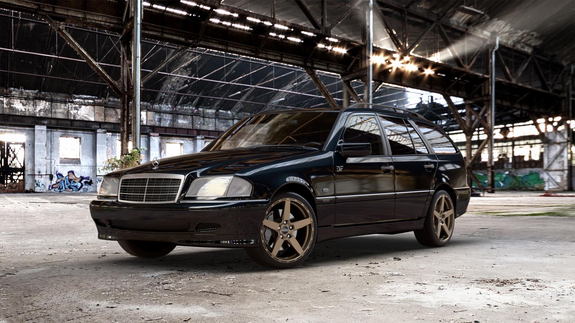 DOTZ MARINABAY BRONZE MATT Felge mit Reifen in 18Zoll Winterfelge Alufelge auf metallic schwarzem Mercedes C-Klasse Typ S202 Kombi ⬇️ mit 15mm Tieferlegung ⬇️ Old Industrial Hall_max_5300mm_2024 Frontansicht_1