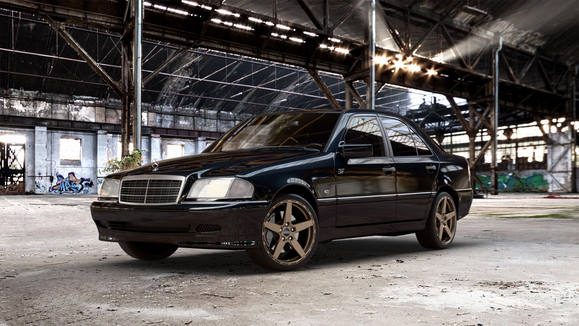 DOTZ MARINABAY BRONZE MATT Felge mit Reifen in 18Zoll Winterfelge Alufelge auf metallic schwarzem Mercedes C-Klasse Typ W202 Limousine ⬇️ mit 15mm Tieferlegung ⬇️ Old Industrial Hall_max_5300mm_2024 Frontansicht_1
