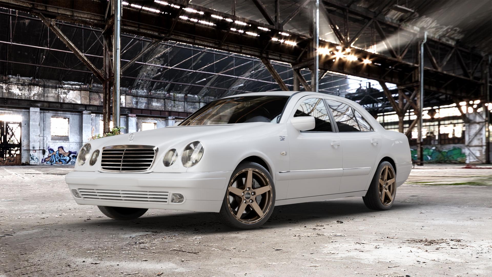 DOTZ MARINABAY BRONZE MATT Felge mit Reifen in 18Zoll Winterfelge Alufelge auf weissem Mercedes E-Klasse Typ W210 Limousine ⬇️ mit 15mm Tieferlegung ⬇️ Old Industrial Hall_max_5300mm_2024 Frontansicht_1