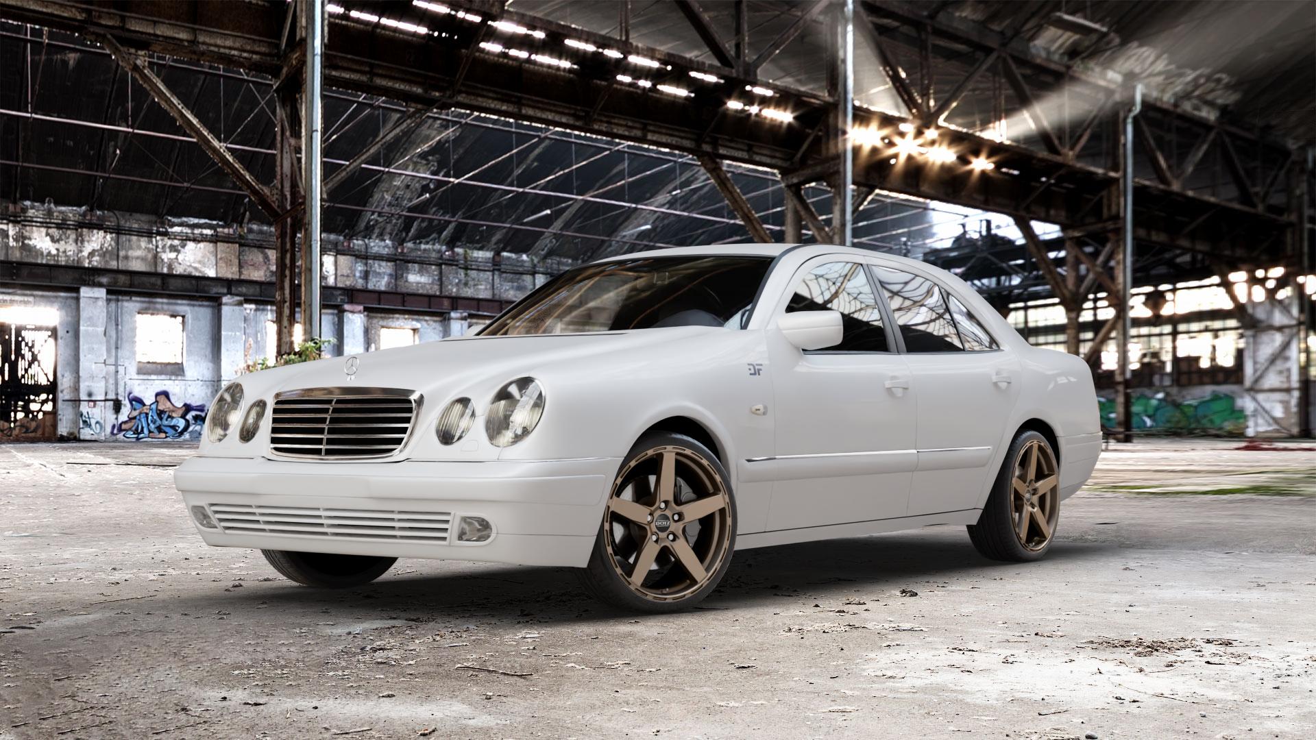 DOTZ MARINABAY BRONZE MATT Felge mit Reifen in 19Zoll Winterfelge Alufelge auf weissem Mercedes E-Klasse Typ W210 Limousine ⬇️ mit 15mm Tieferlegung ⬇️ Old Industrial Hall_max_5300mm_2024 Frontansicht_1
