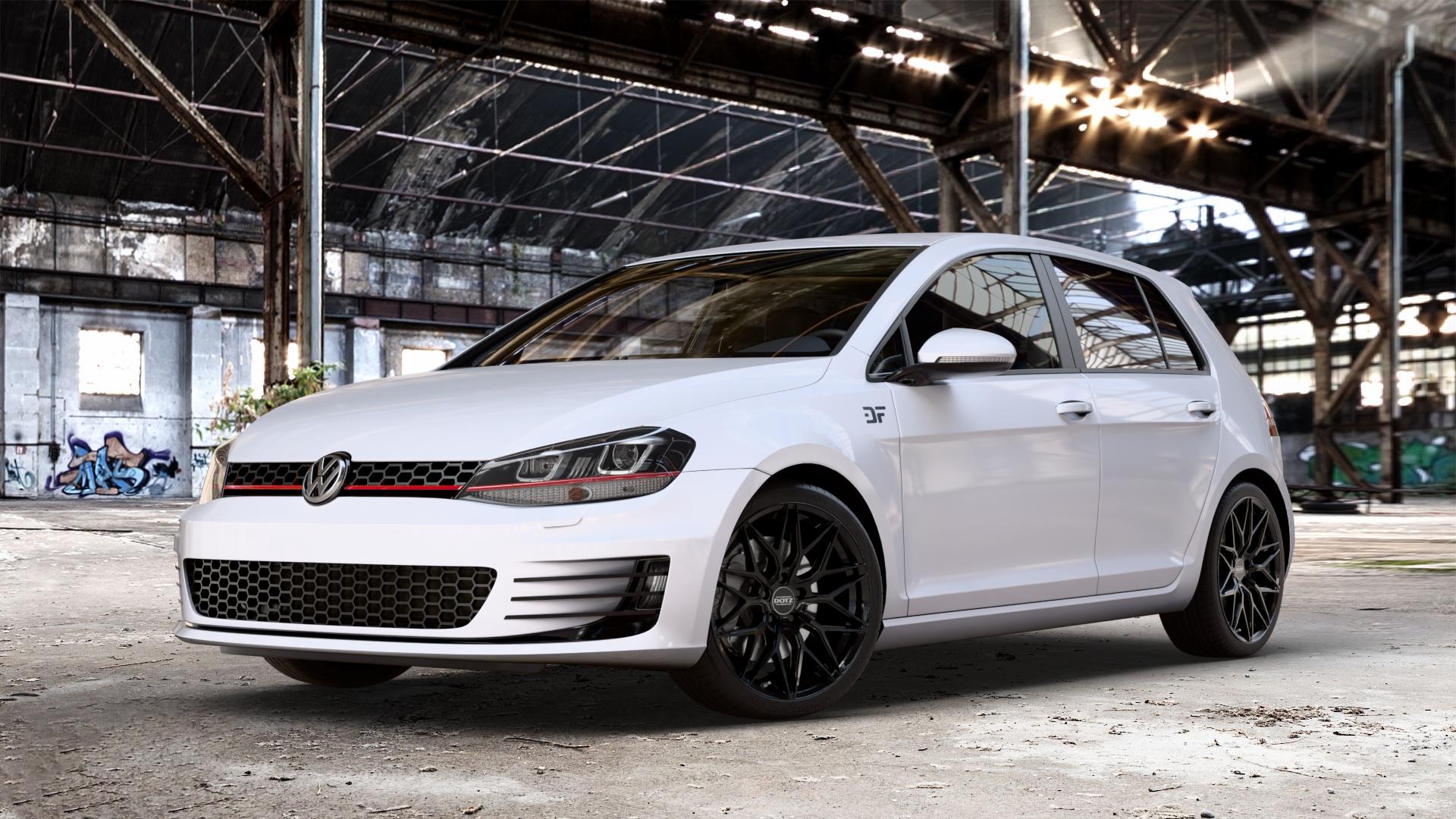 DOTZ SUZUKA BLACK Felge mit Reifen schwarz in 18Zoll Winterfelge Alufelge auf weissem Volkswagen (VW) Golf 7 2,0l GTI 162kW (220 PS) Performance 169kW (230 ⬇️ mit 15mm Tieferlegung ⬇️ Old Industrial Hall_max_4400mm_2024 Frontansicht_1