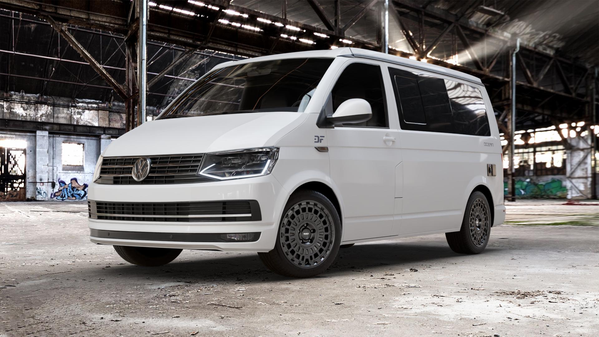 DOTZ TALARA BLACK MATT Felge mit Reifen schwarz in 18Zoll Winterfelge Alufelge auf weissem Volkswagen (VW) T6 California Beach ⬇️ mit 15mm Tieferlegung ⬇️ Old Industrial Hall_max_5300mm_2024 Frontansicht_1