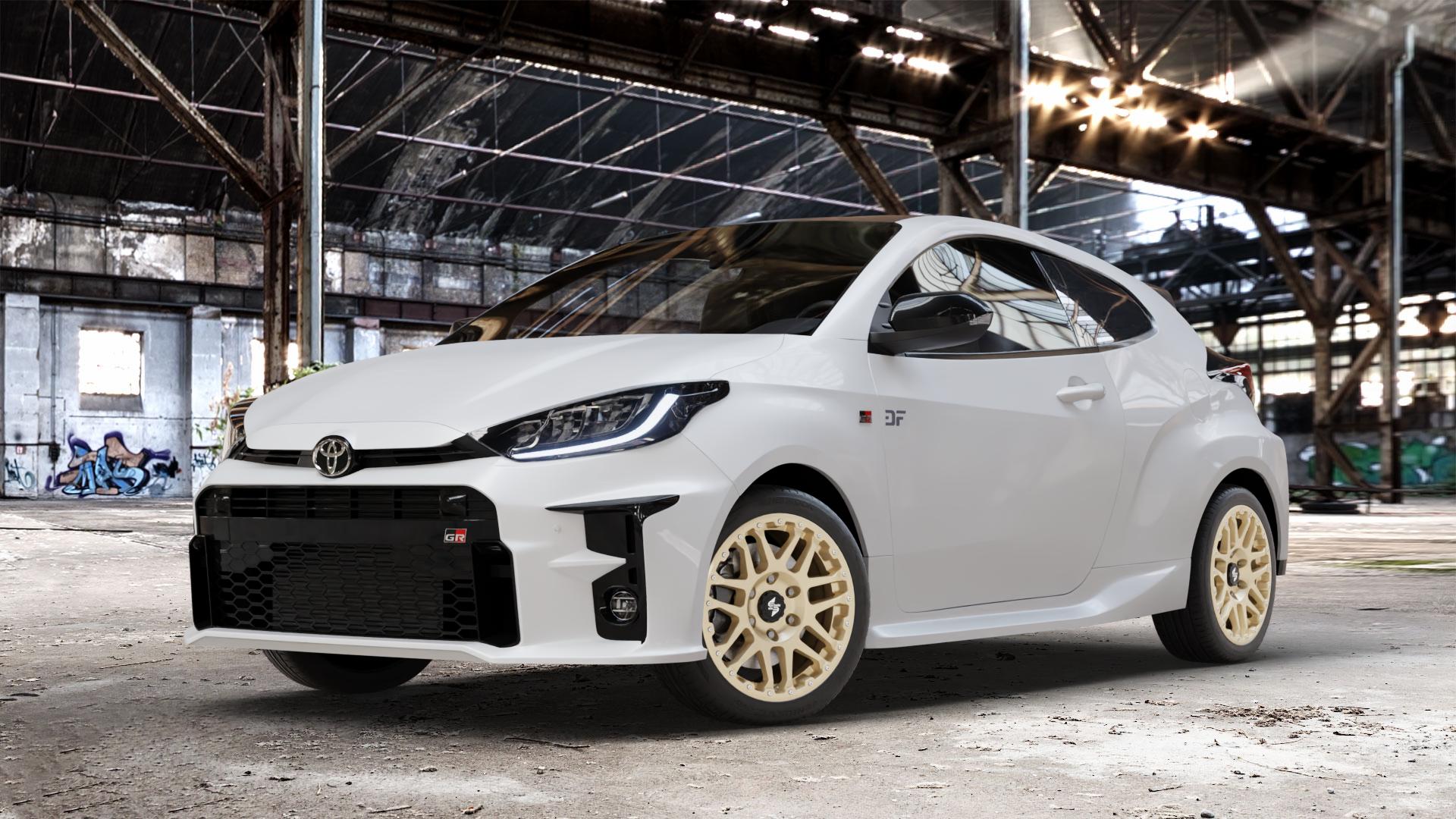etabeta COMBAT CV Gold shiny Felge mit Reifen in 17Zoll Winterfelge Alufelge auf weissem Toyota Yaris IV Typ XPA1F(EU,M) l kW (0 PS) GR XPA1G(EU,M) ⬇️ mit 15mm Tieferlegung ⬇️ Old Industrial Hall_max_4400mm_2024 Frontansicht_1