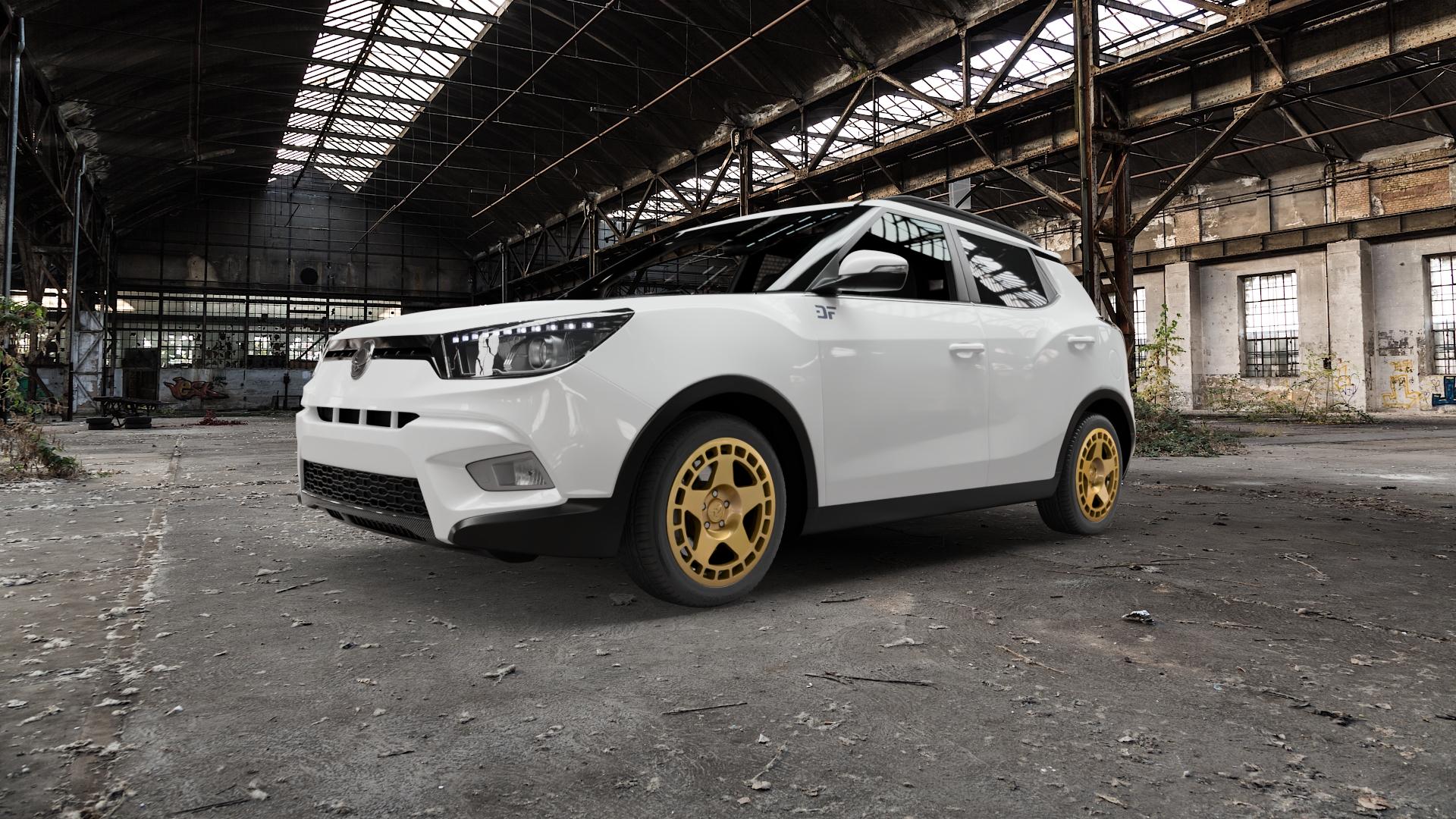fifteen52 Turbomac Gold Felge mit Reifen in 17Zoll Winterfelge Alufelge auf weissem Ssangyong Tivoli Typ XK ⬇️ mit 15mm Tieferlegung ⬇️ Old Industrial Hall_max5000mm_2022 Frontansicht_1