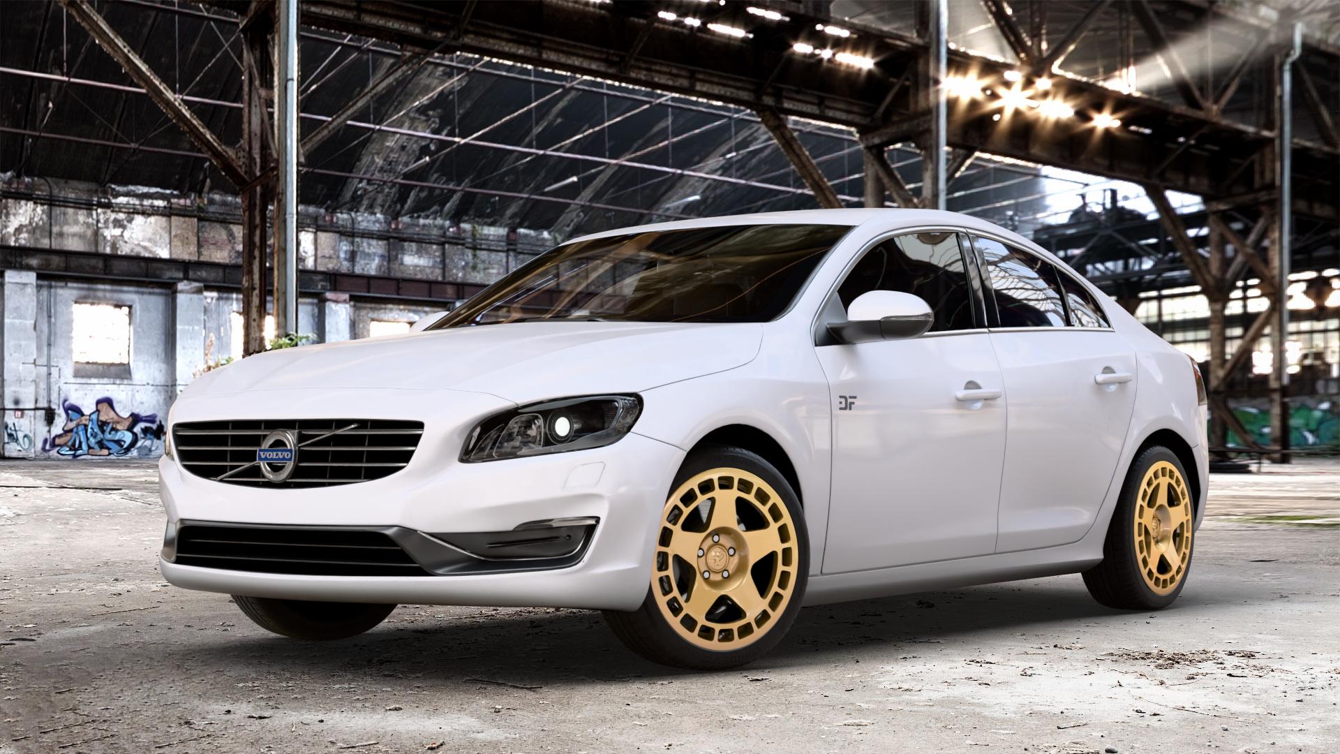 fifteen52 Turbomac Gold Felge mit Reifen in 18Zoll Winterfelge Alufelge auf weissem Volvo S60 II Typ F ⬇️ mit 15mm Tieferlegung ⬇️ Old Industrial Hall_max_4400mm_2024 Frontansicht_1