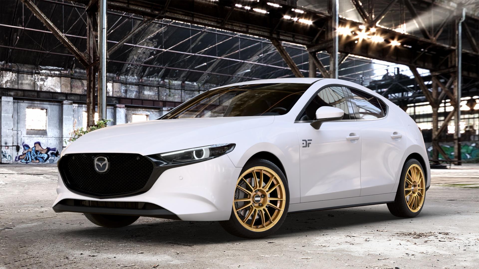 Fondmetal 9RR GLOSSY GOLD Felge mit Reifen in 18Zoll Winterfelge Alufelge auf weissem Mazda 3 (19-) Fließheck (BP) (BPE) ⬇️ mit 15mm Tieferlegung ⬇️ Old Industrial Hall_max_4400mm_2024 Frontansicht_1