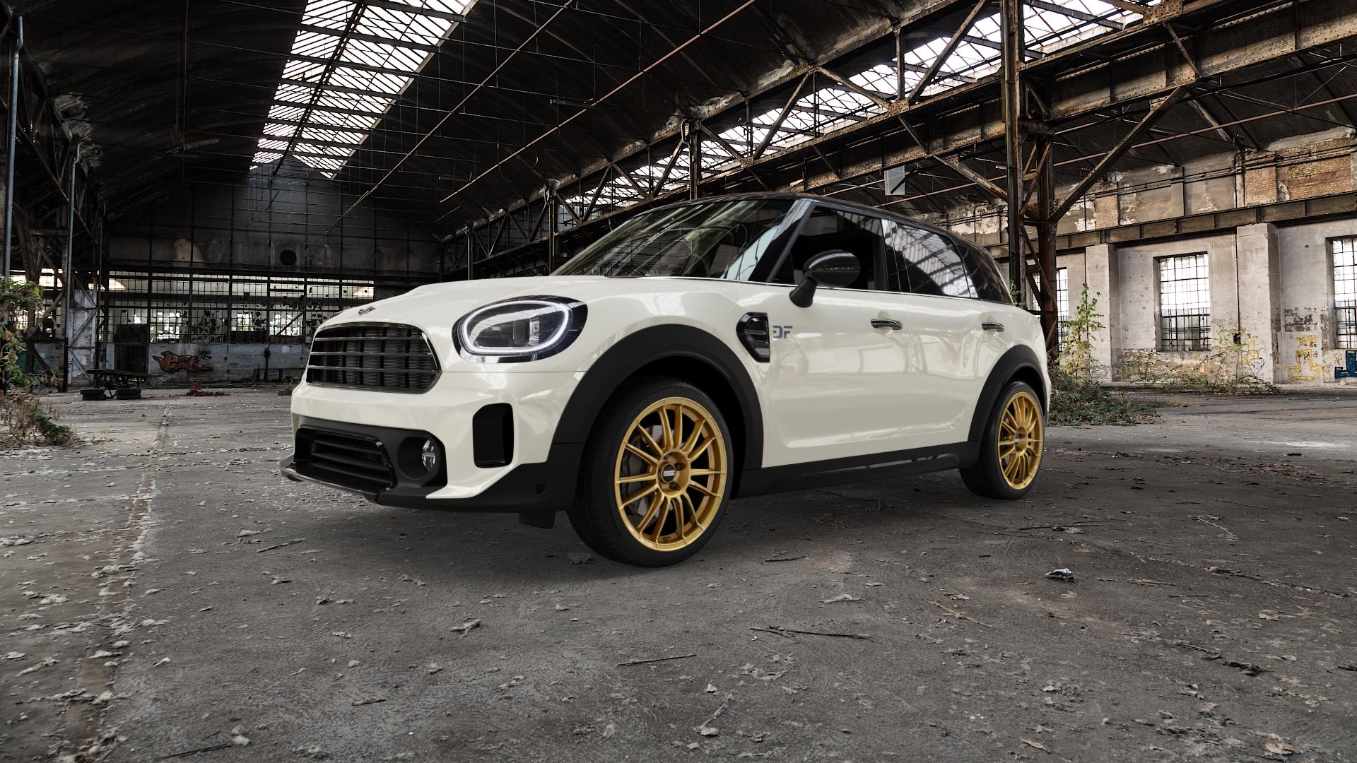 Fondmetal 9RR GLOSSY GOLD Felge mit Reifen in 19Zoll Winterfelge Alufelge auf weissem Mini F60 Typ FMX (Countryman) Facelift ⬇️ mit 15mm Tieferlegung ⬇️ Old Industrial Hall_max5000mm_2022 Frontansicht_1