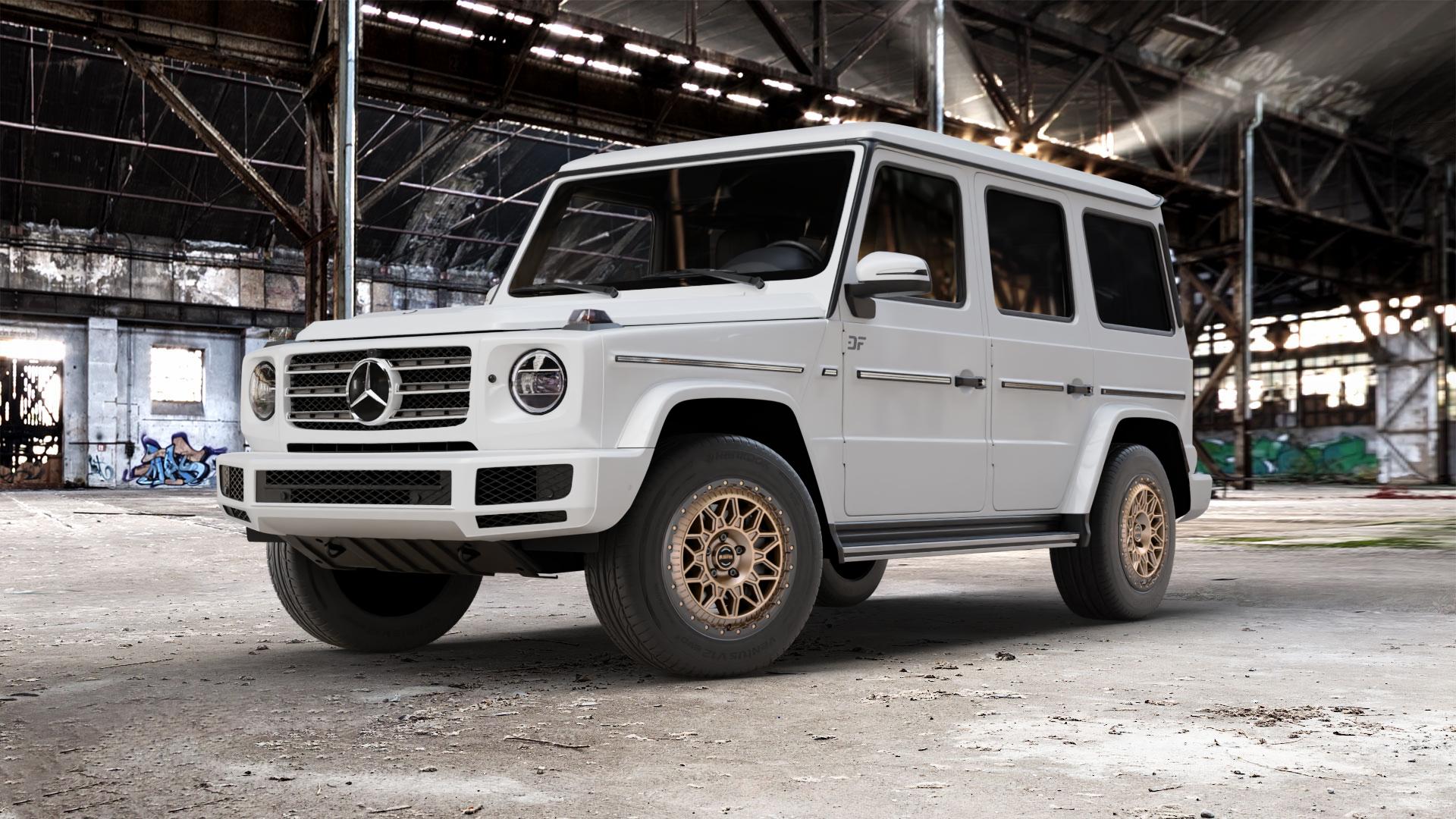 Fondmetal BLUSTER MATT BRAUN BLACK LIP Felge mit Reifen schwarz bronze in 18Zoll Winterfelge Alufelge auf weissem Mercedes G-Klasse Typ W463 Facelift (18->) ⬇️ mit 15mm Tieferlegung ⬇️ Old Industrial Hall_max_5300mm_2024 Frontansicht_1