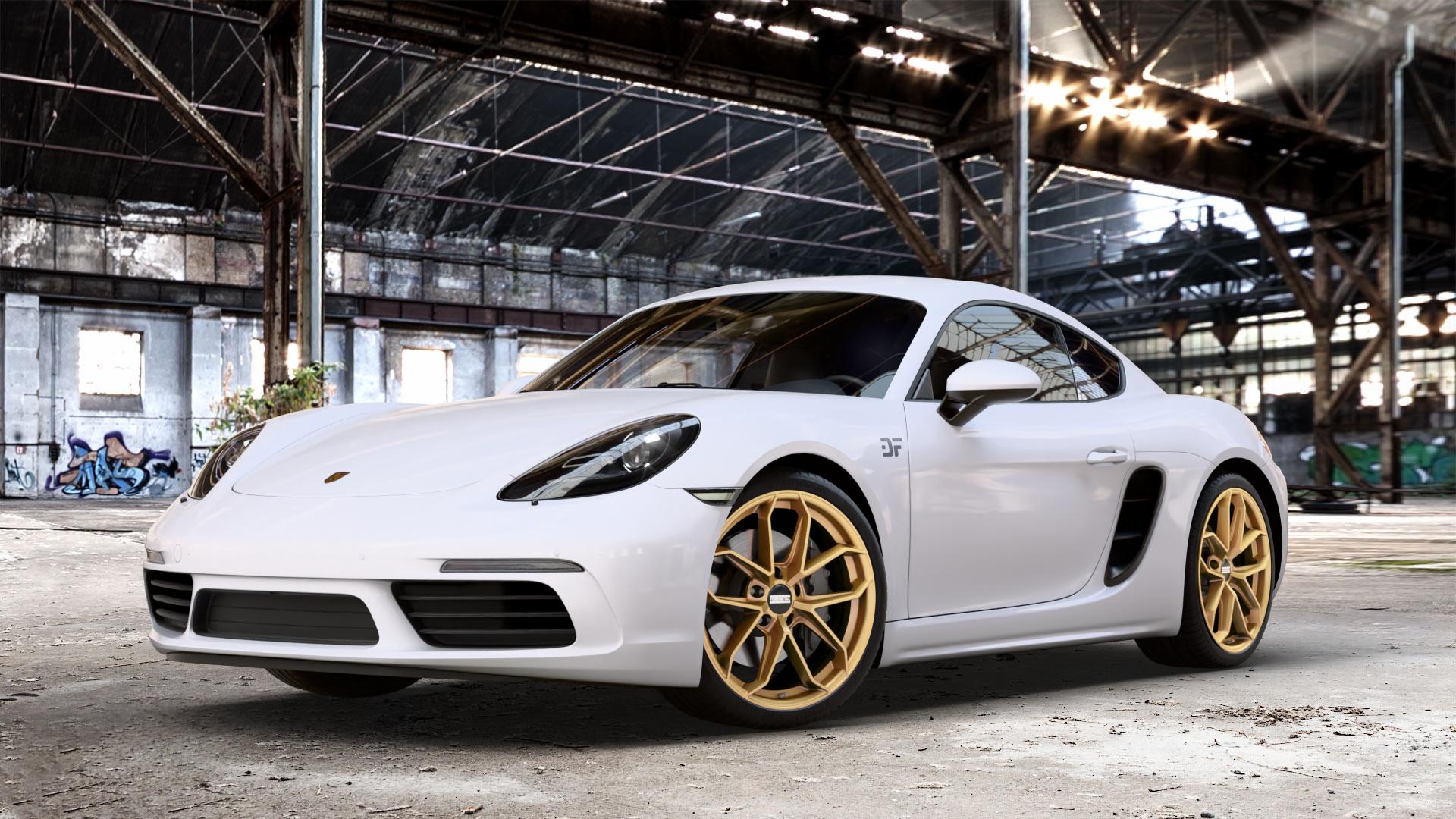 Fondmetal ZELOS MATT GOLD Felge mit Reifen in 20Zoll Winterfelge Alufelge auf weissem Porsche 718 Cayman Typ 982 ⬇️ mit 15mm Tieferlegung ⬇️ Old Industrial Hall_max_4400mm_2024 Frontansicht_1