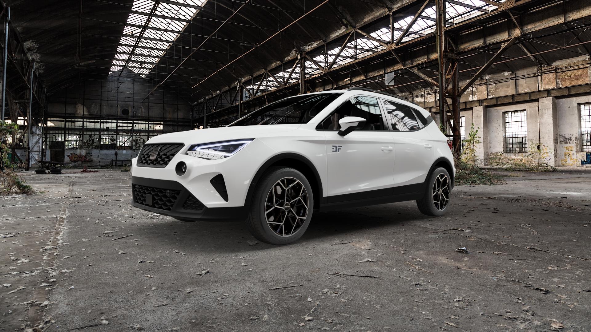 GMP Italia Cartesio Black Diamond Felge mit Reifen schwarz in 17Zoll Winterfelge Alufelge auf weissem Seat Arona Typ KJ Facelift ⬇️ mit 15mm Tieferlegung ⬇️ Old Industrial Hall_max5000mm_2022 Frontansicht_1