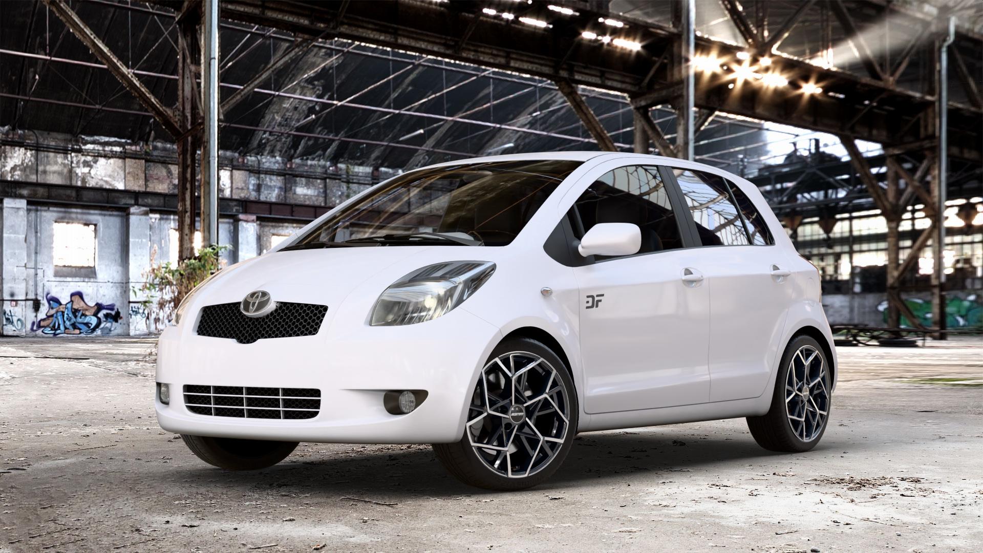 GMP Italia Cartesio Black Diamond Felge mit Reifen schwarz in 17Zoll Winterfelge Alufelge auf weissem Toyota Yaris II Typ XP9F ⬇️ mit 15mm Tieferlegung ⬇️ Old Industrial Hall_max_4400mm_2024 Frontansicht_1