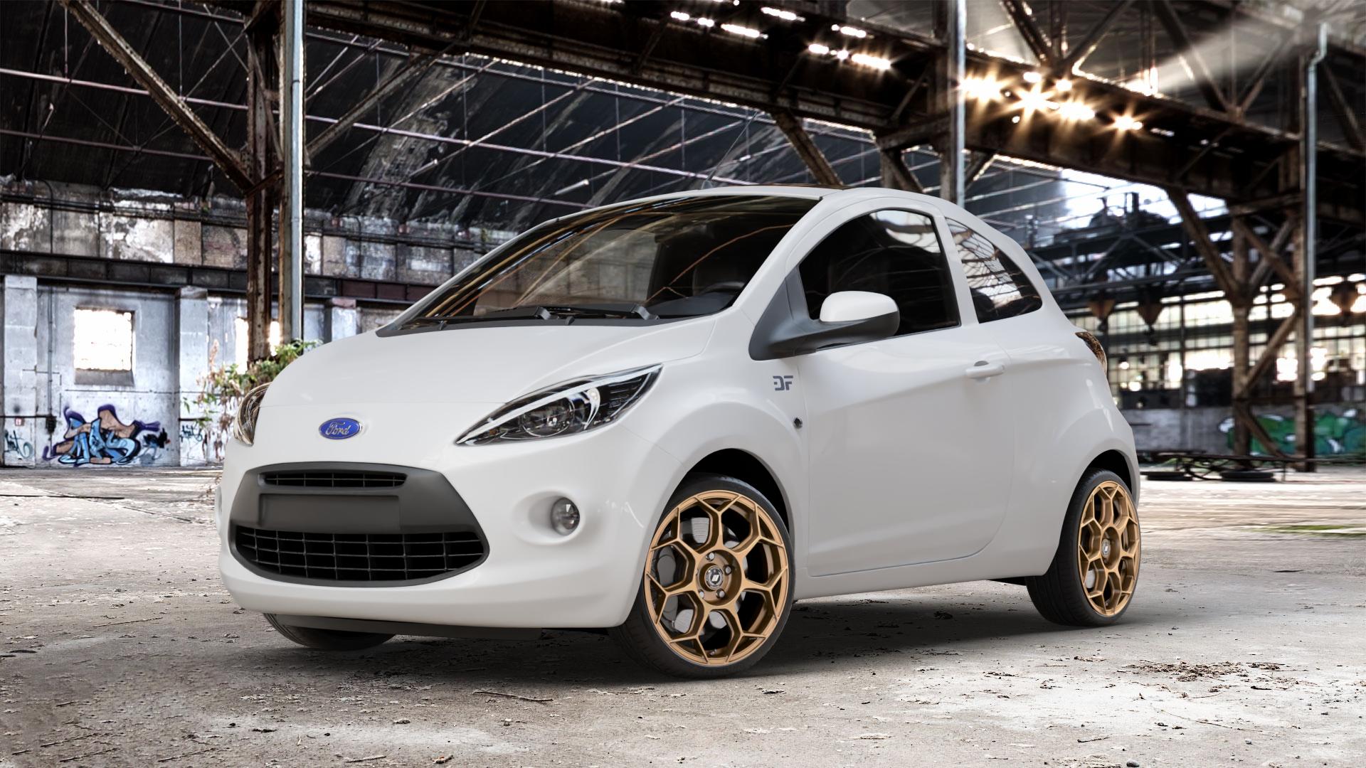 GMP Italia Raceway Oro Corsa Felge mit Reifen gold in 17Zoll Winterfelge Alufelge auf weissem Ford KA Typ RU8 ⬇️ mit 15mm Tieferlegung ⬇️ Old Industrial Hall_max_4400mm_2024 Frontansicht_1
