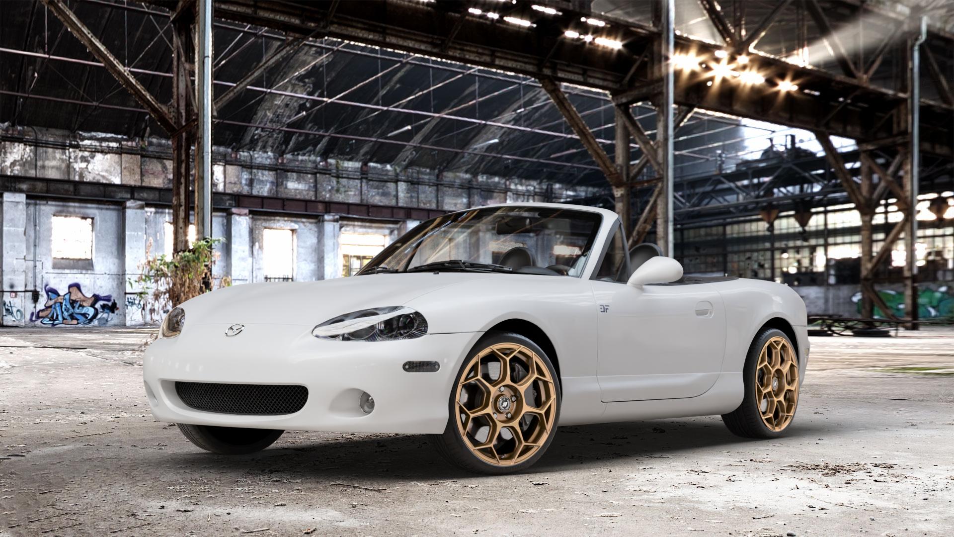 GMP Italia Raceway Oro Corsa Felge mit Reifen gold in 17Zoll Winterfelge Alufelge auf weissem Mazda MX-5 II (NB) ⬇️ mit 15mm Tieferlegung ⬇️ Old Industrial Hall_max_4400mm_2024 Frontansicht_1