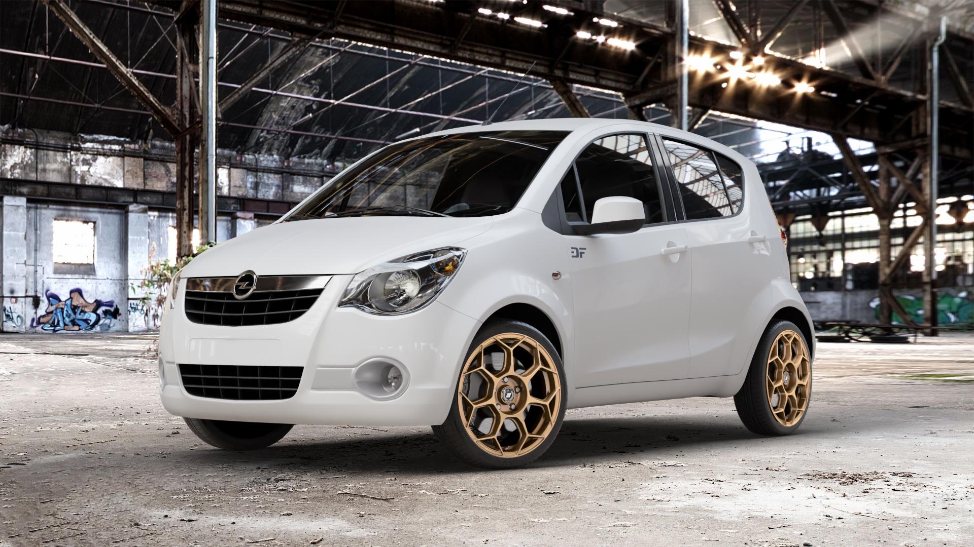 GMP Italia Raceway Oro Corsa Felge mit Reifen gold in 17Zoll Winterfelge Alufelge auf weissem Opel Agila Typ H-B ⬇️ mit 15mm Tieferlegung ⬇️ Old Industrial Hall_max_4400mm_2024 Frontansicht_1