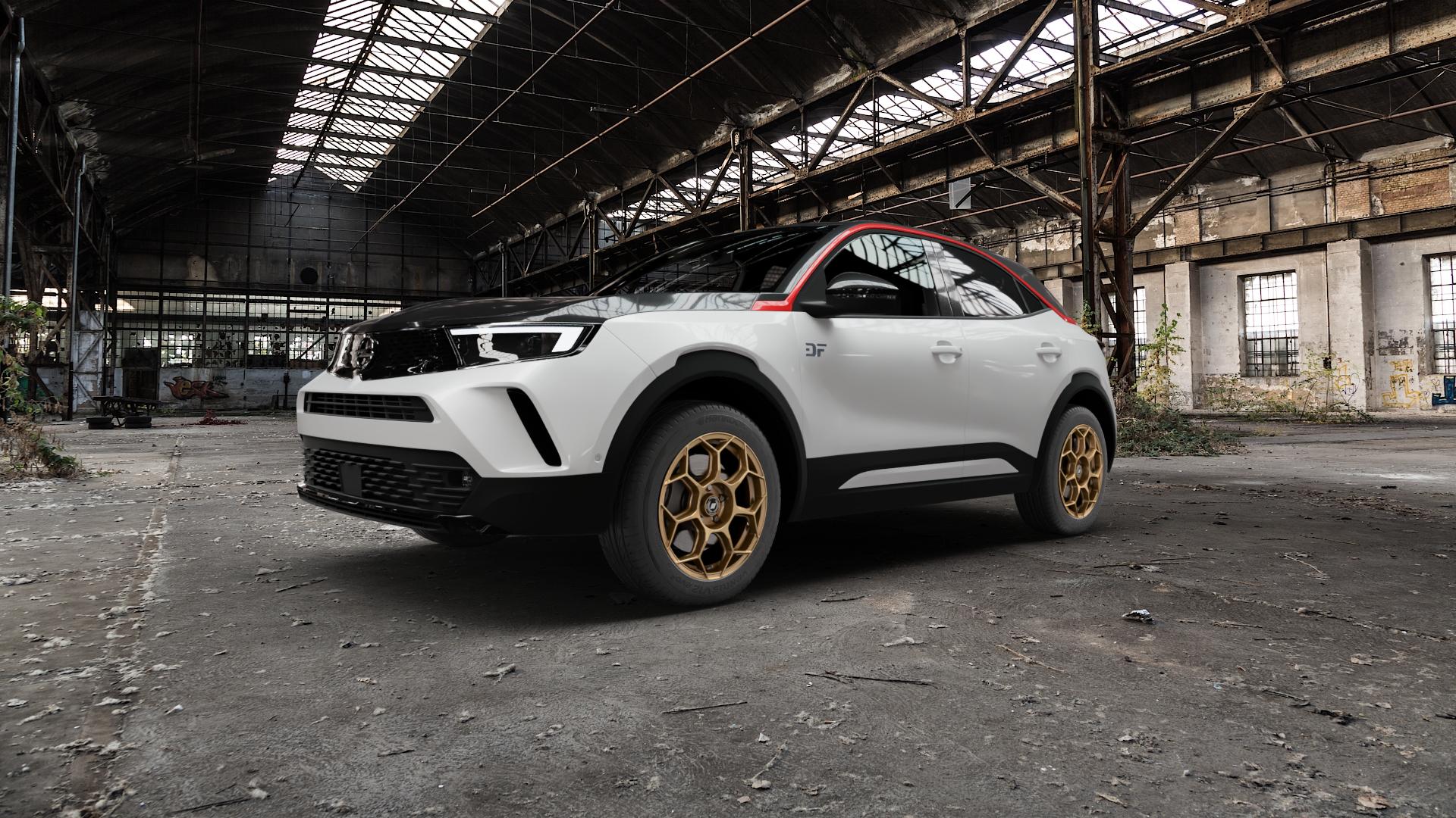 GMP Italia Raceway Oro Corsa Felge mit Reifen gold in 17Zoll Winterfelge Alufelge auf weissem Opel Mokka-e Typ U 0,0l 57kW (77 PS) ⬇️ mit 15mm Tieferlegung ⬇️ Old Industrial Hall_max5000mm_2022 Frontansicht_1