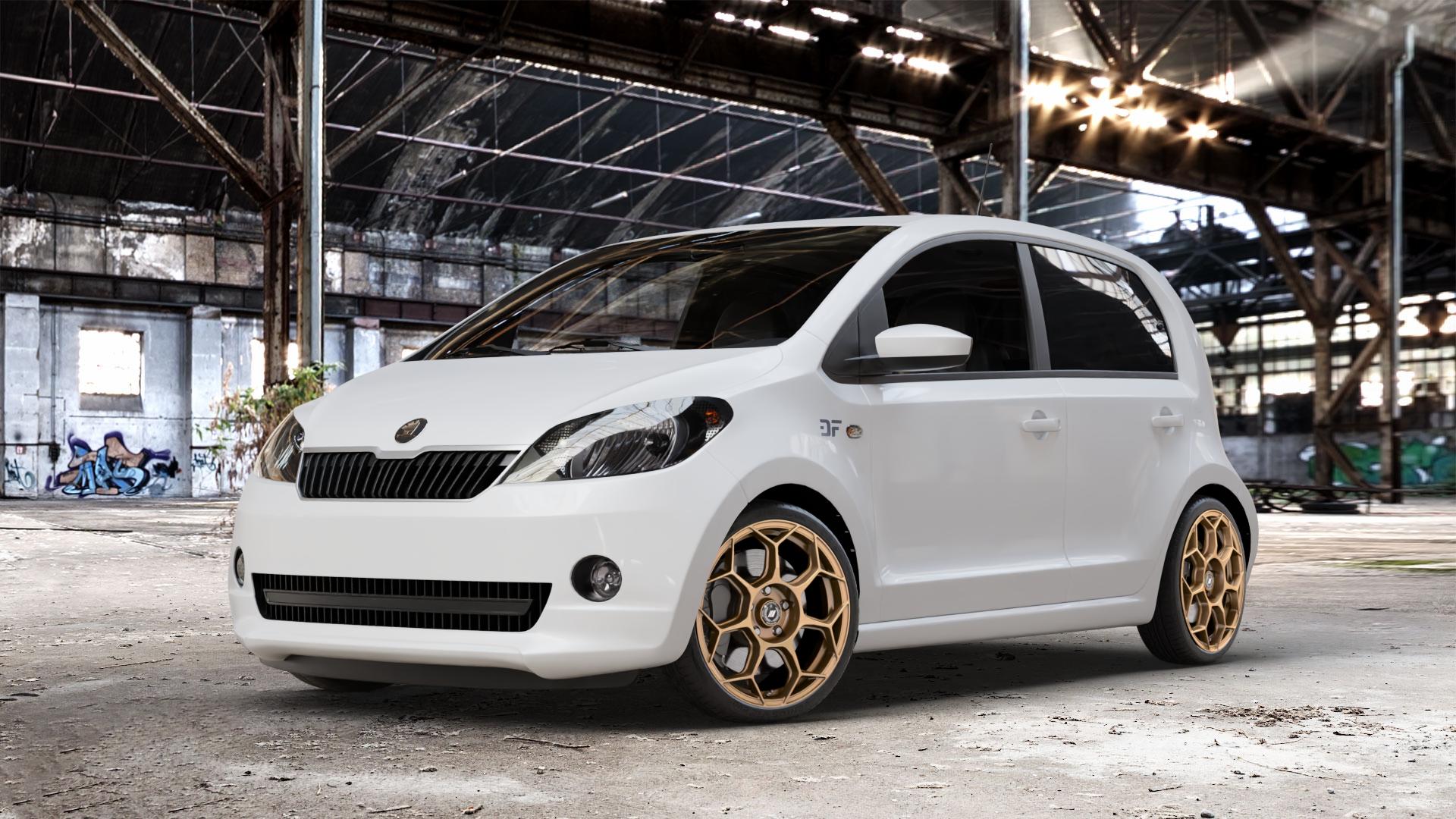 GMP Italia Raceway Oro Corsa Felge mit Reifen gold in 17Zoll Winterfelge Alufelge auf weissem Skoda Citigo Typ AA ⬇️ mit 15mm Tieferlegung ⬇️ Old Industrial Hall_max_4400mm_2024 Frontansicht_1