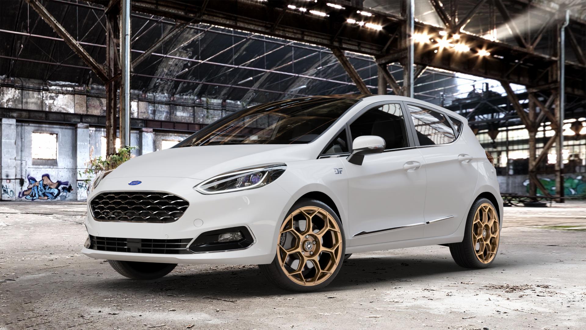 GMP Italia Raceway Oro Corsa Felge mit Reifen gold in 18Zoll Winterfelge Alufelge auf weissem Ford Fiesta VII Typ JHH ⬇️ mit 15mm Tieferlegung ⬇️ Old Industrial Hall_max_4400mm_2024 Frontansicht_1