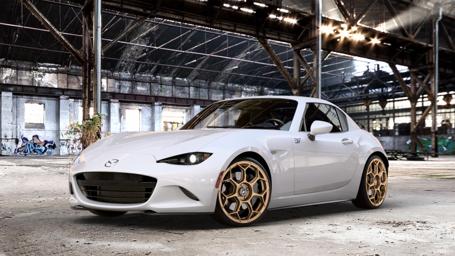 GMP Italia Raceway Oro Corsa Felge mit Reifen gold in 18Zoll Winterfelge Alufelge auf weissem Mazda MX-5 IV RF (ND) ⬇️ mit 15mm Tieferlegung ⬇️ Old Industrial Hall_max_4400mm_2024 Frontansicht_1