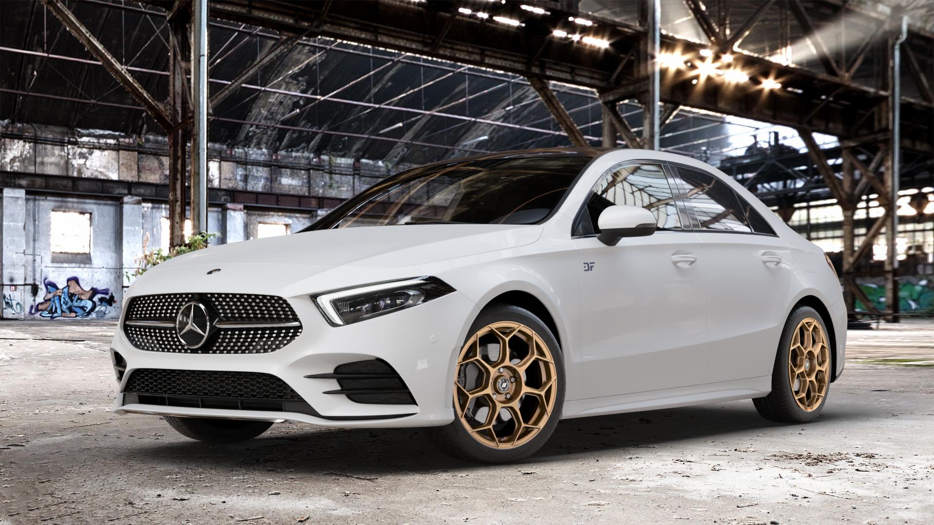 GMP Italia Raceway Oro Corsa Felge mit Reifen gold in 18Zoll Winterfelge Alufelge auf weissem Mercedes A-Klasse IV Typ 177 (F2A) Limousine Facelift ⬇️ mit 15mm Tieferlegung ⬇️ Old Industrial Hall_max_4400mm_2024 Frontansicht_1