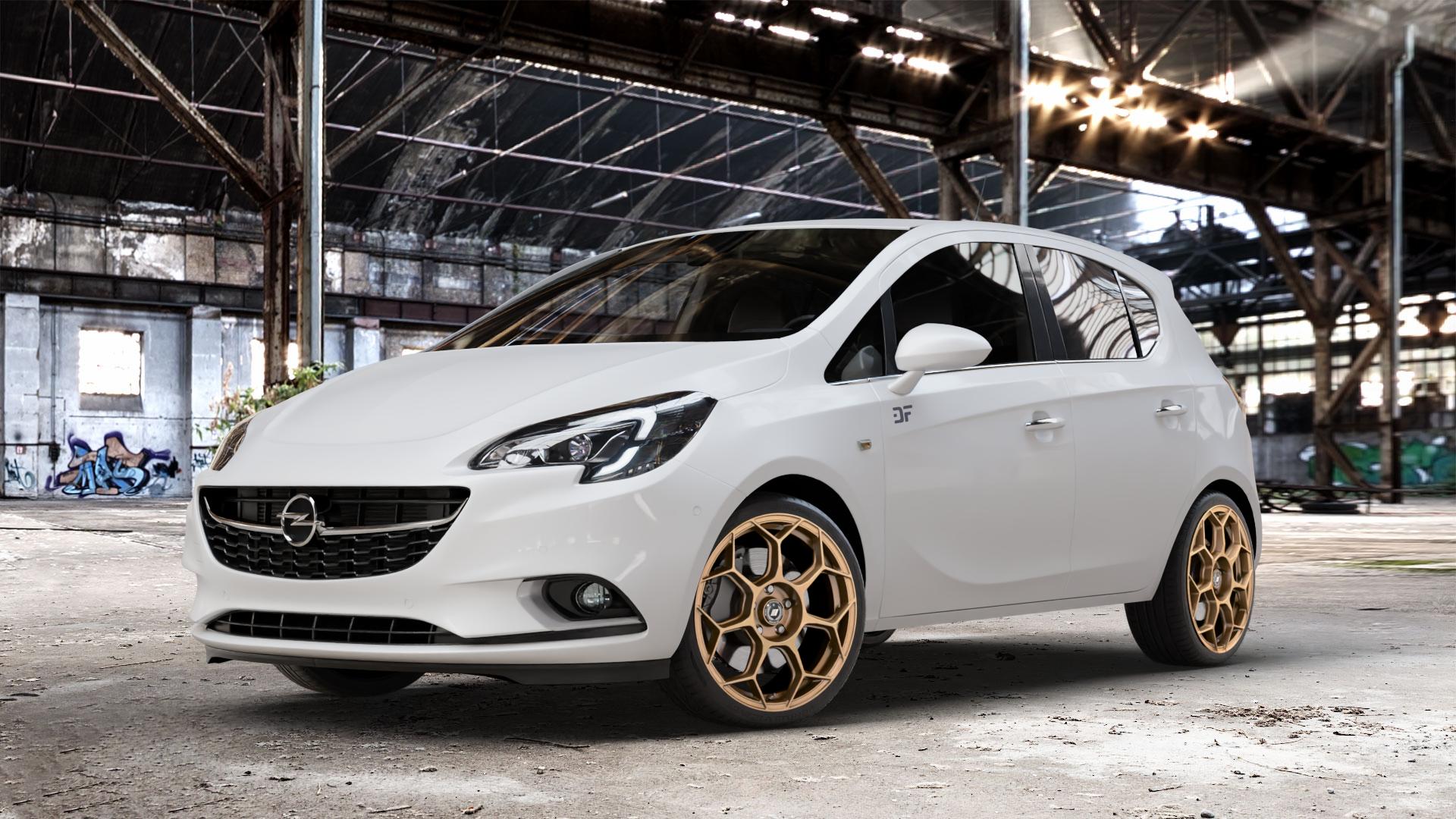 GMP Italia Raceway Oro Corsa Felge mit Reifen gold in 18Zoll Winterfelge Alufelge auf weissem Opel Corsa E Typ S-D ⬇️ mit 15mm Tieferlegung ⬇️ Old Industrial Hall_max_4400mm_2024 Frontansicht_1