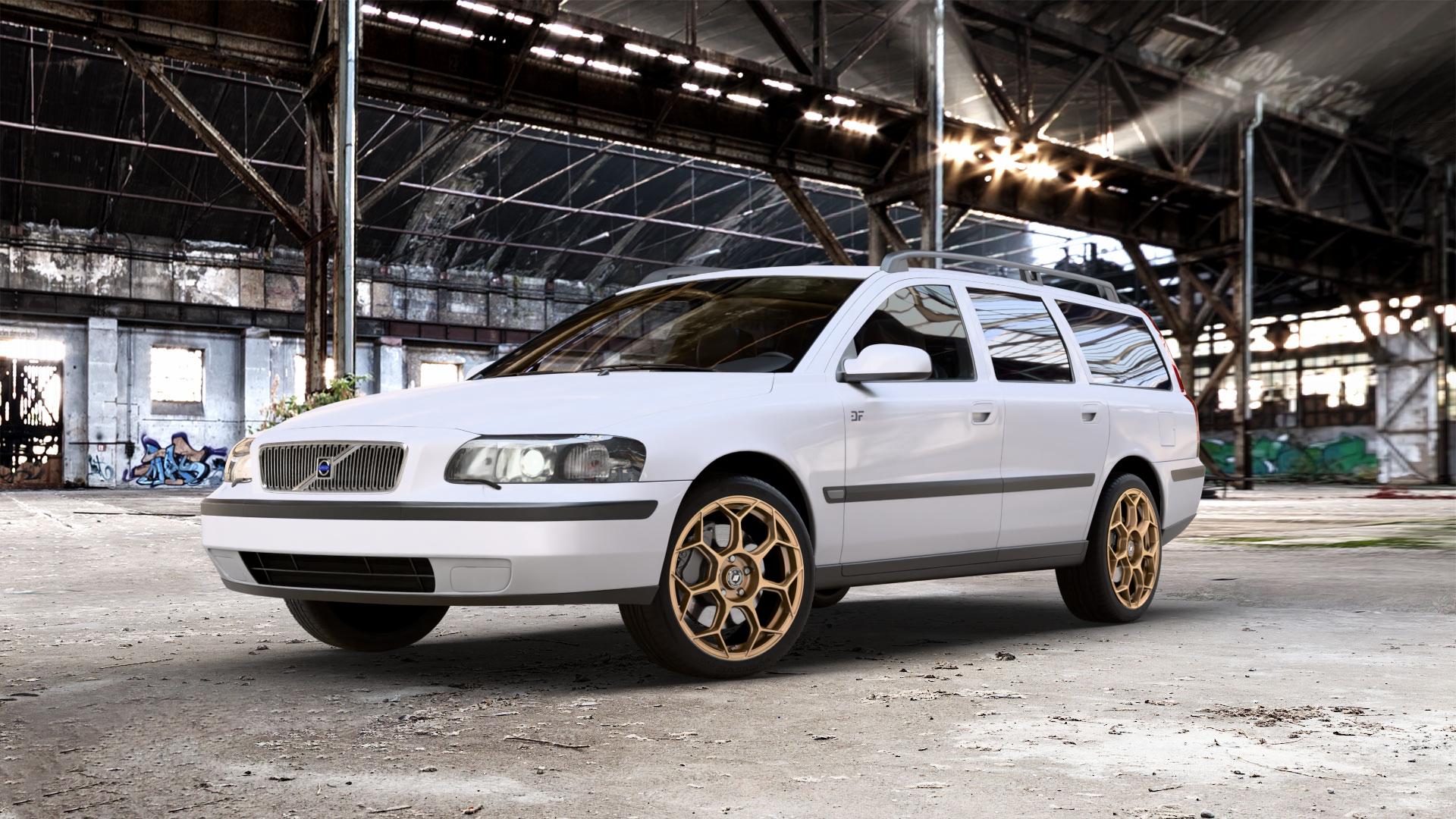 GMP Italia Raceway Oro Corsa Felge mit Reifen gold in 18Zoll Winterfelge Alufelge auf weissem Volvo V70 II Typ S 2,4l 125kW (170 PS) D5 120kW (163 2,0l T 132kW (179 2,3l T5 184kW (250 103kW (140 Bifue D 93kW (126 96kW (131 136kW (185 AWD 147kW (200 191kW ⬇️ mit 15mm Tieferlegung ⬇️ Old Industrial Hall_max_5300mm_2024 Frontansicht_1