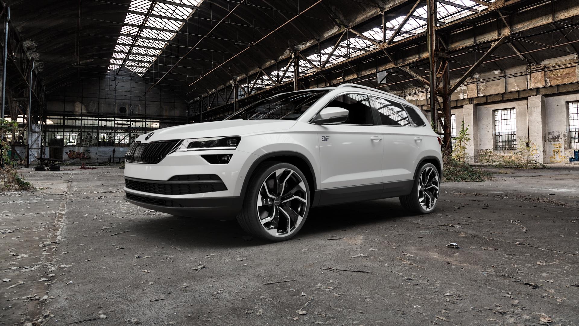 GMP Italia Rebel Black Diamond Felge mit Reifen schwarz in 20Zoll Winterfelge Alufelge auf weissem Skoda Karoq Typ NU Scout ⬇️ mit 15mm Tieferlegung ⬇️ Old Industrial Hall_max5000mm_2022 Frontansicht_1