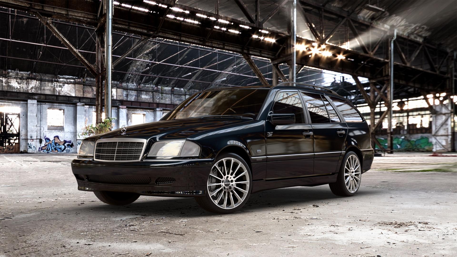 GMP Italia Stellar Anthr. diamond Felge mit Reifen grau anthrazit in 18Zoll Winterfelge Alufelge auf metallic schwarzem Mercedes C-Klasse Typ S202 Kombi ⬇️ mit 15mm Tieferlegung ⬇️ Old Industrial Hall_max_5300mm_2024 Frontansicht_1