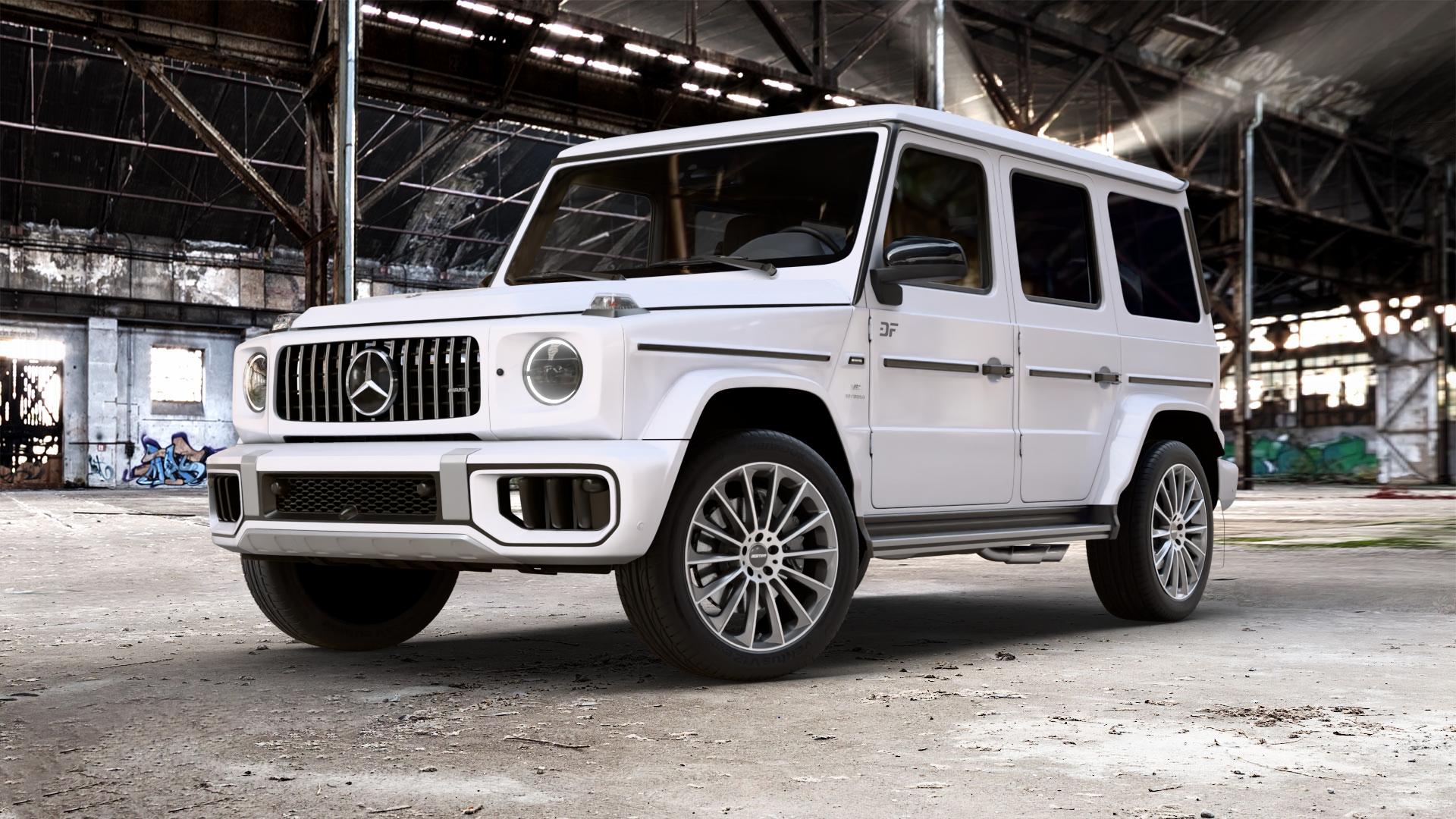 GMP Italia Stellar Anthr. diamond Felge mit Reifen grau anthrazit in 21Zoll Winterfelge Alufelge auf weissem Mercedes G-Klasse Typ W465 3,0l G 450d 270kW Mild-Hybrid (367 PS) 500 330kW (449 0,0l 580 EQ 223kW (303 4,0l 63 AMG 430kW (585 ⬇️ mit 15mm Tieferlegung ⬇️ Old Industrial Hall_max_5300mm_2024 Frontansicht_1