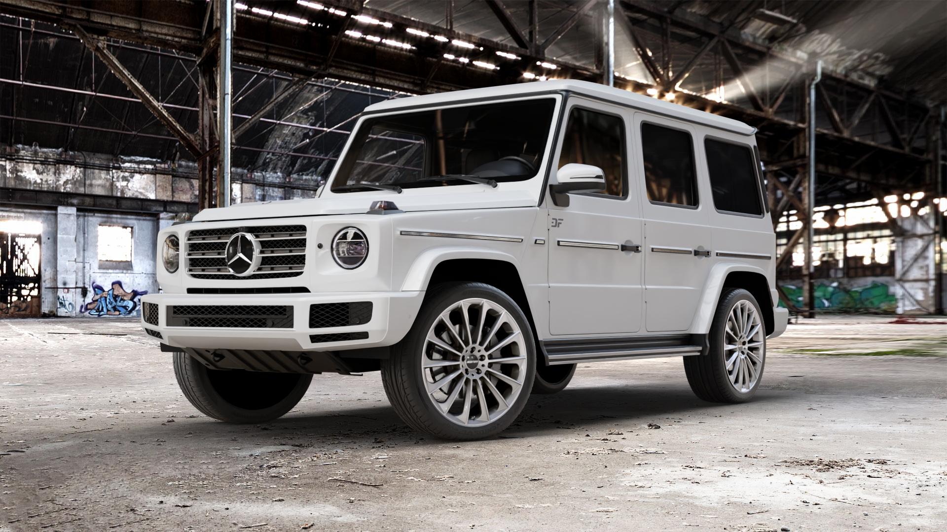 GMP Italia Stellar Silver Felge mit Reifen silber in 22Zoll Winterfelge Alufelge auf weissem Mercedes G-Klasse Typ W463 Facelift (18->) ⬇️ mit 15mm Tieferlegung ⬇️ Old Industrial Hall_max_5300mm_2024 Frontansicht_1