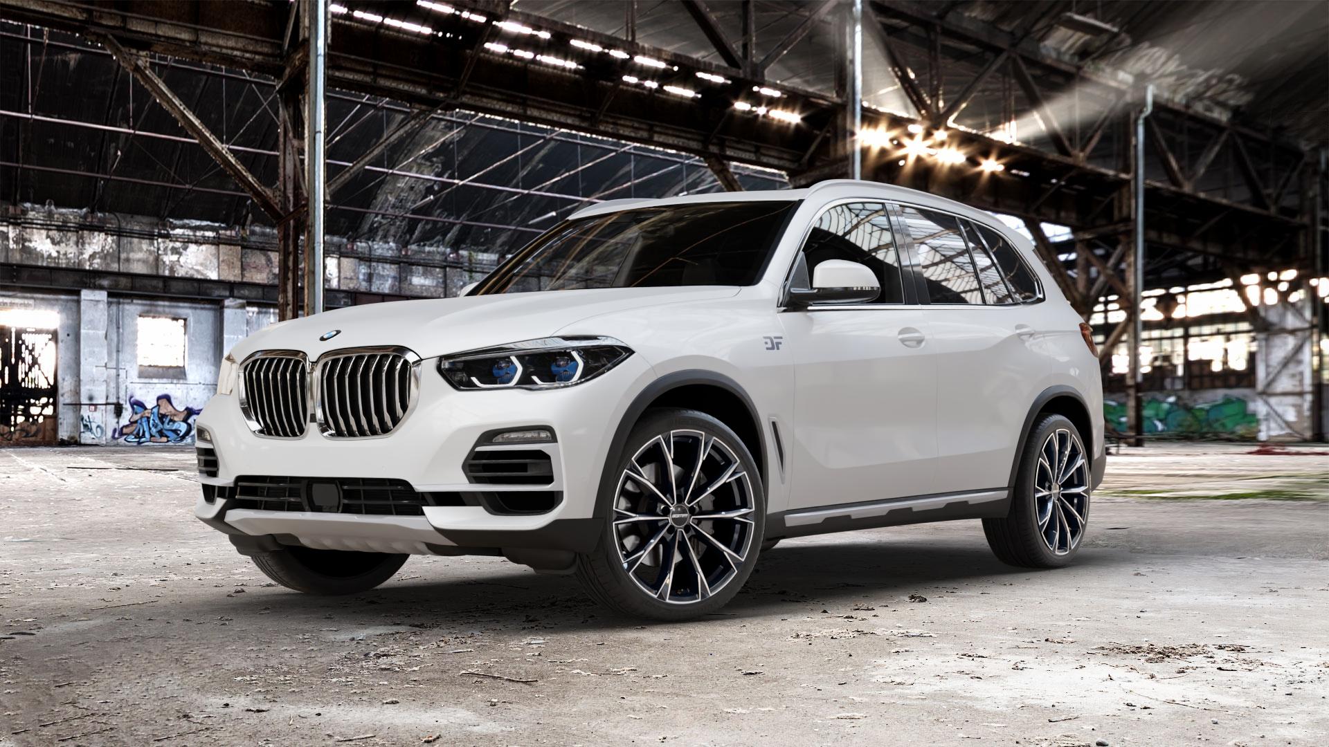 GMP Italia TOTALE Black Diamond Felge mit Reifen schwarz in 21Zoll Winterfelge Alufelge auf weissem BMW X5 Typ G05 (G5X) ⬇️ mit 15mm Tieferlegung ⬇️ Old Industrial Hall_max_5300mm_2024 Frontansicht_1