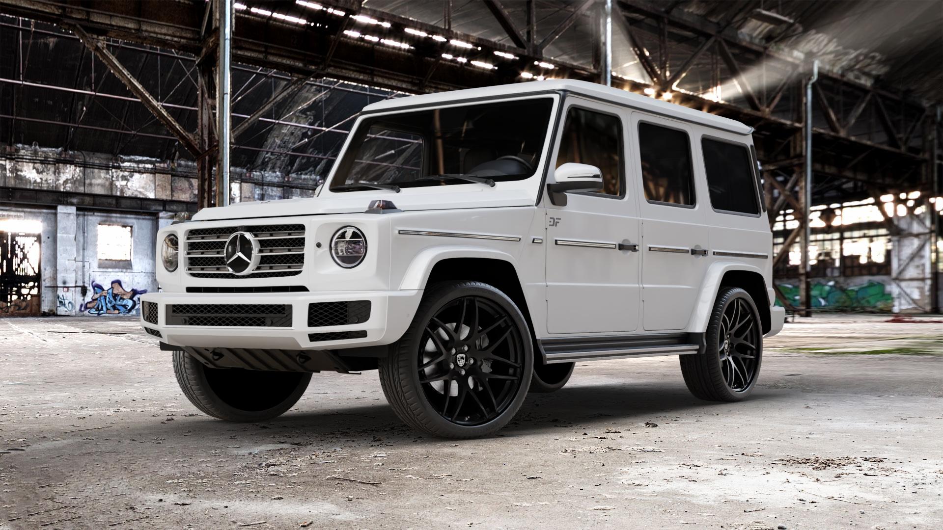 Lumma Design CLR 23 GT schwarz matt Felge mit Reifen in 23Zoll Winterfelge Alufelge auf weissem Mercedes G-Klasse Typ W463 Facelift (18->) ⬇️ mit 15mm Tieferlegung ⬇️ Old Industrial Hall_max_5300mm_2024 Frontansicht_1